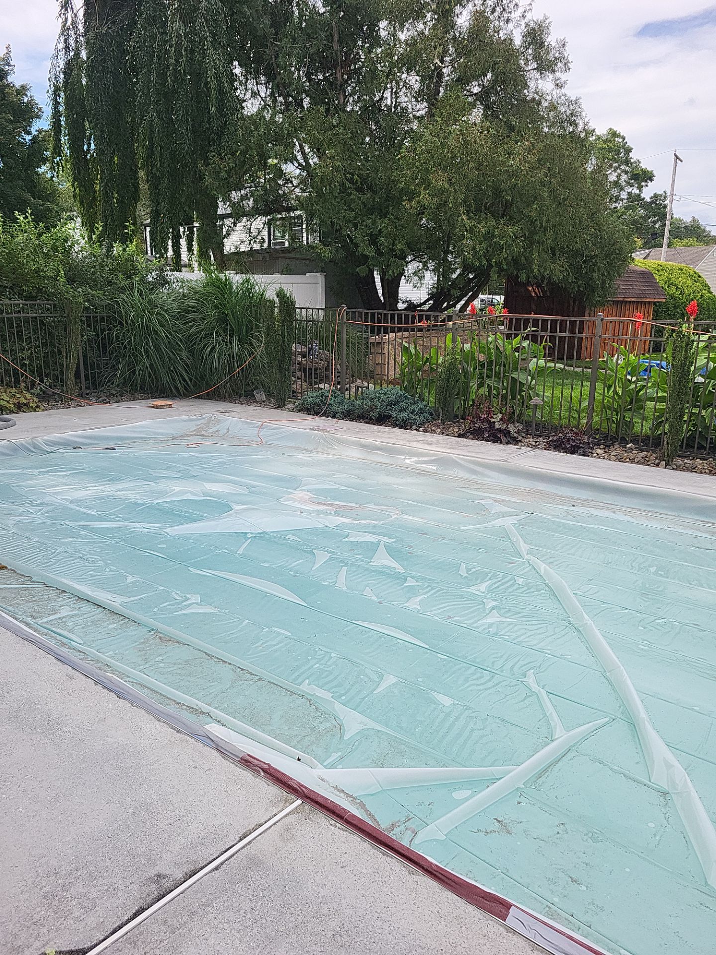 Blue Granite Pool Patio Concrete Coating in Lincoln Park by Spectrum Painting, LLC