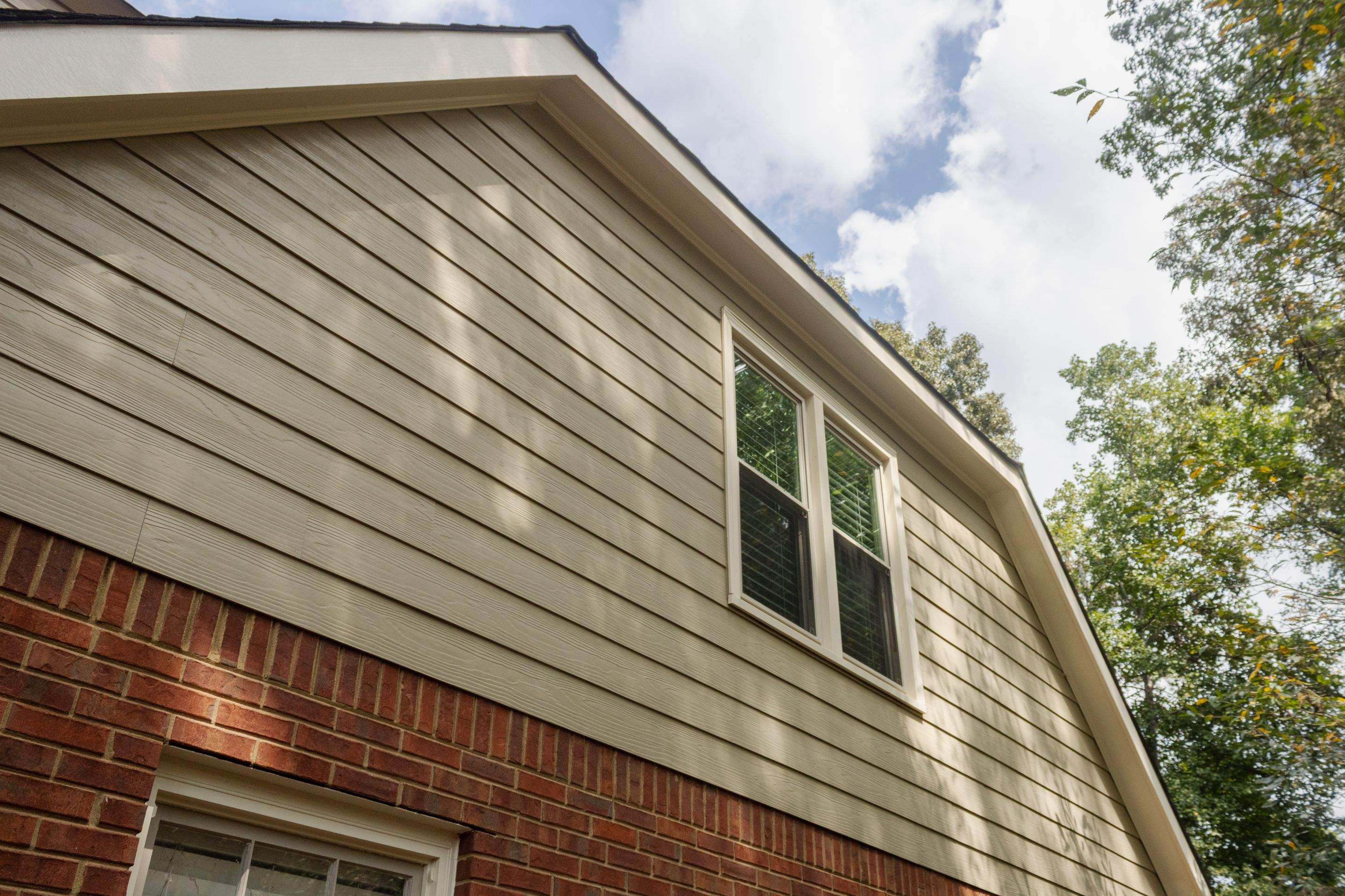 Marietta, GA Rotten Wood Replacement, Chimney Corner Board Installation, Gutter Replacement, and Exterior Painting by Nelson Exteriors