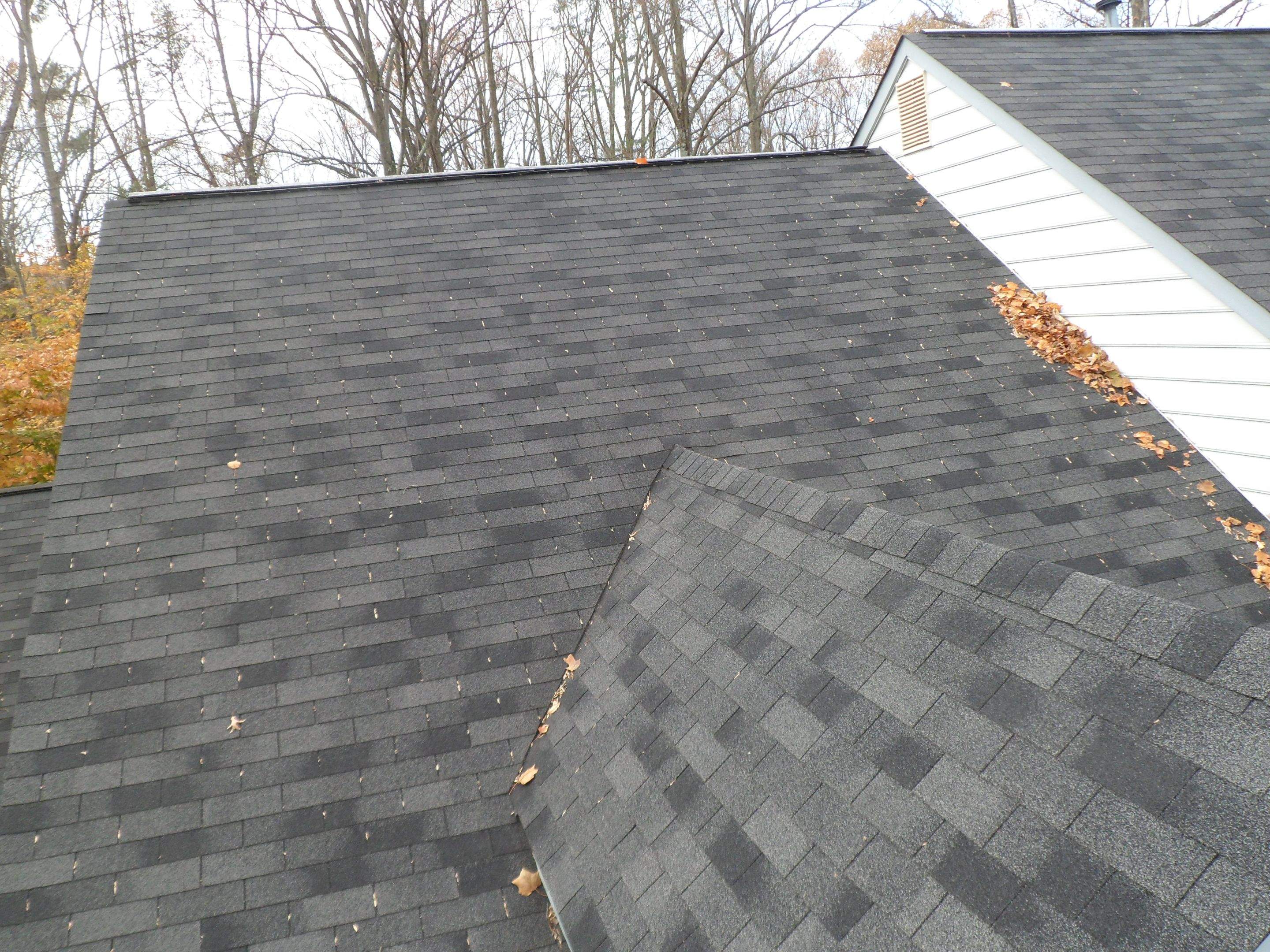 Residential Roofing Installation using Charcoal Black by Alpha Design Services