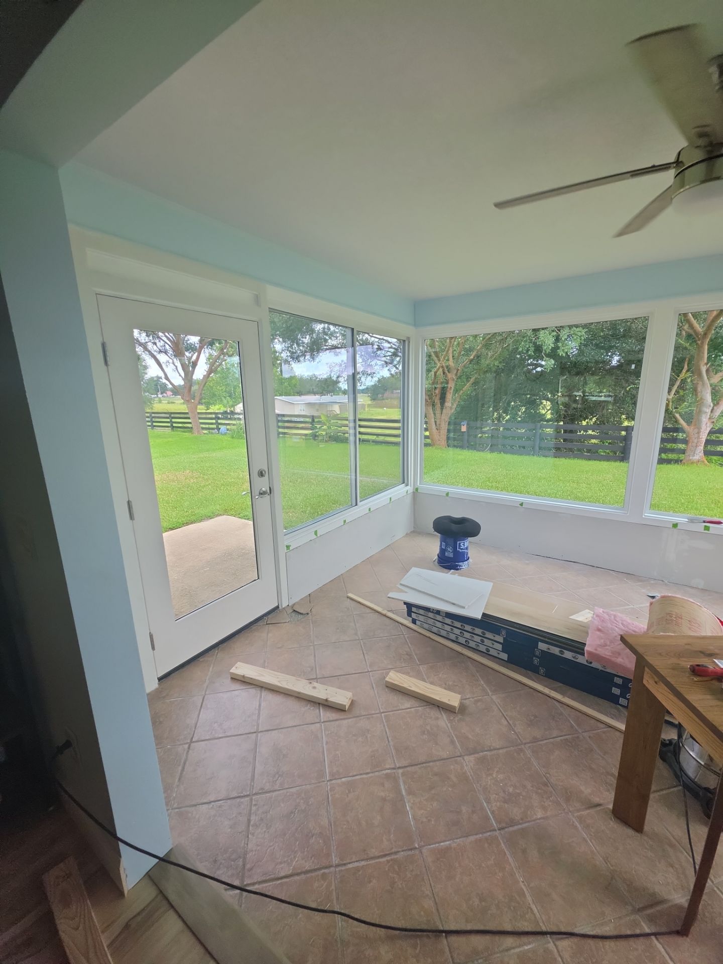 Sunroom Conversion with Alside Windows and Provia Door in The Villages by Windows & Doors Store