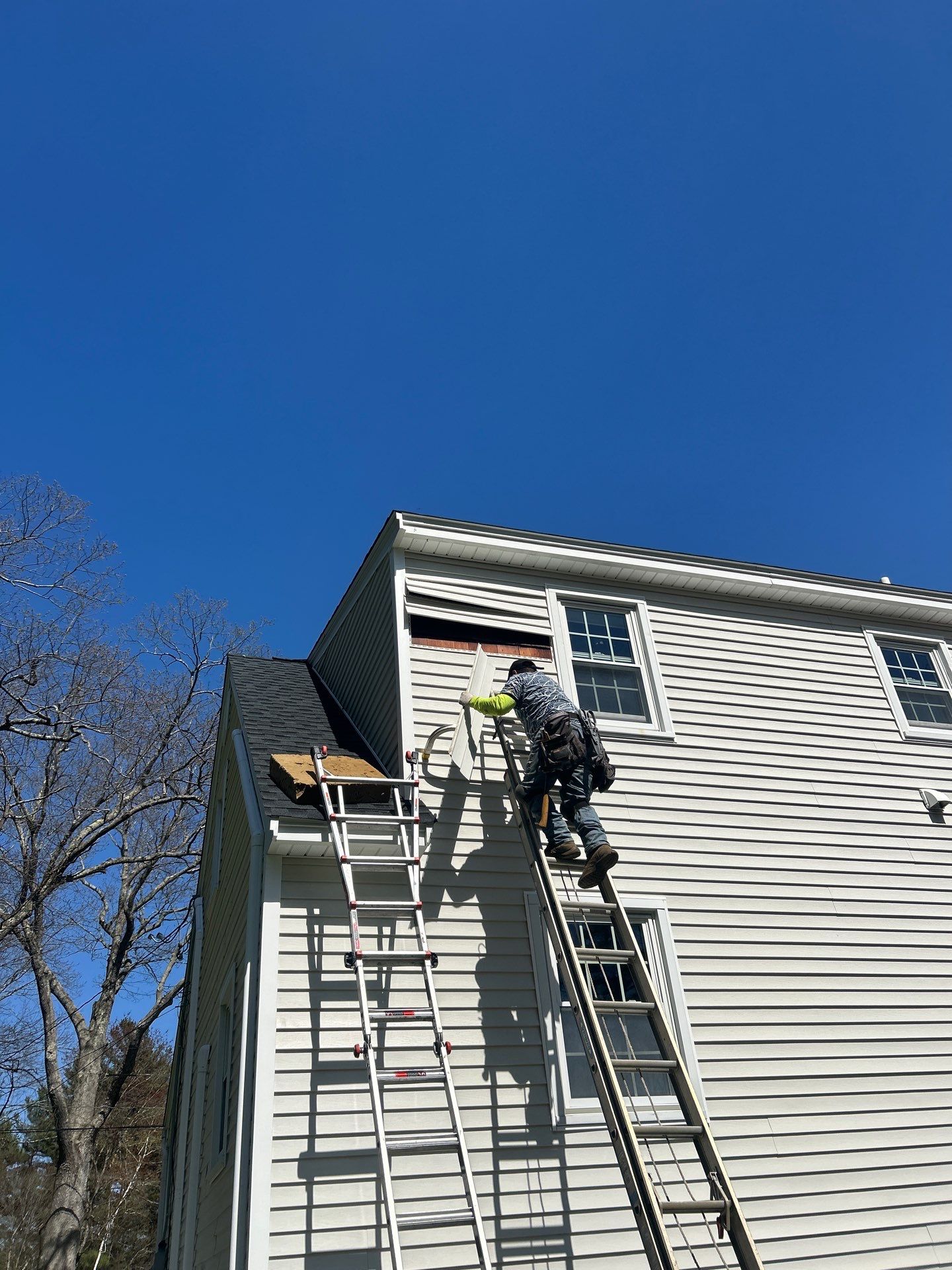 Vinyl Siding Repair with Spot Replacement by Mighty Dog Roofing of Greater Middlesex County