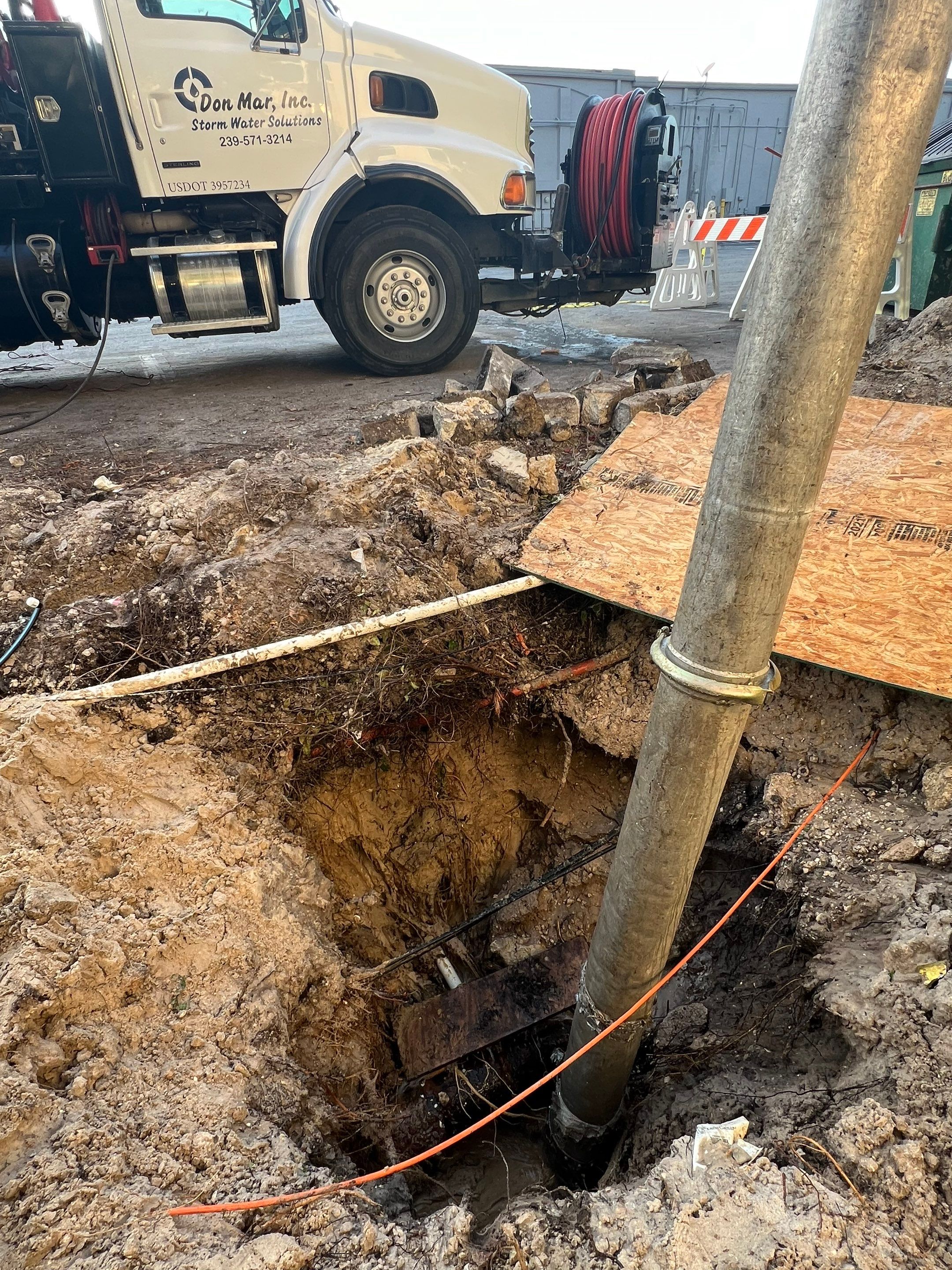 Hydro Excavating a Water Main for Repair by Don Mar, Inc. Storm Water Solutions