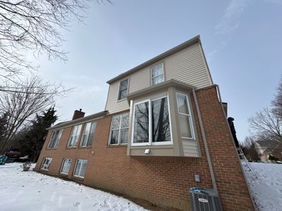 Siding Replacement using Alside Charter Oak D4.5"