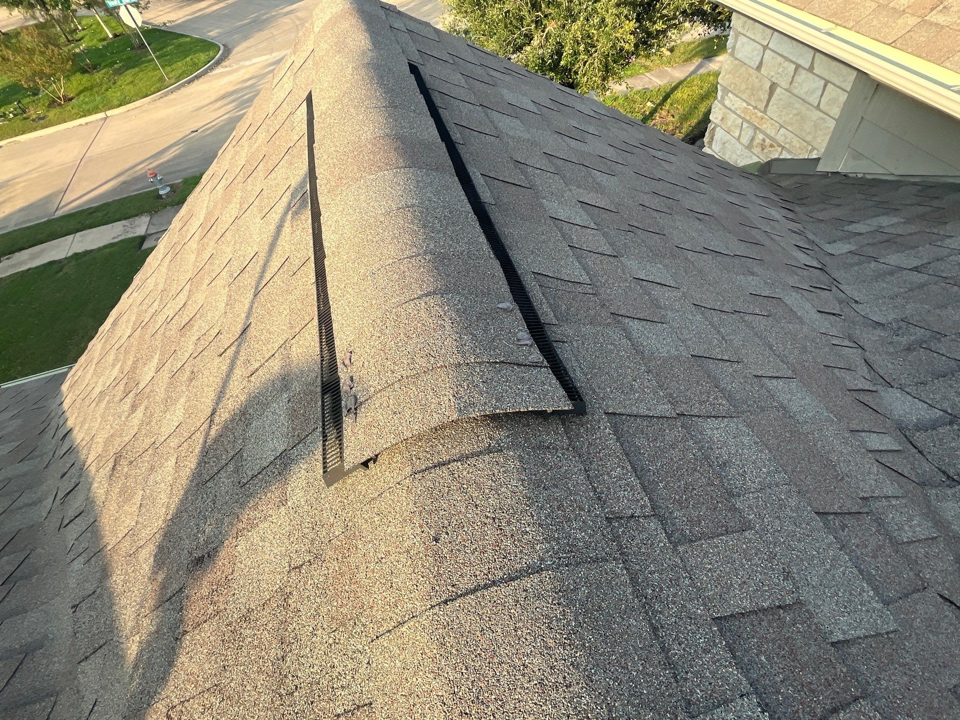 Hail Damage using Owen's Corning Duration (Lifetime) Shingles by Roof Repair Company