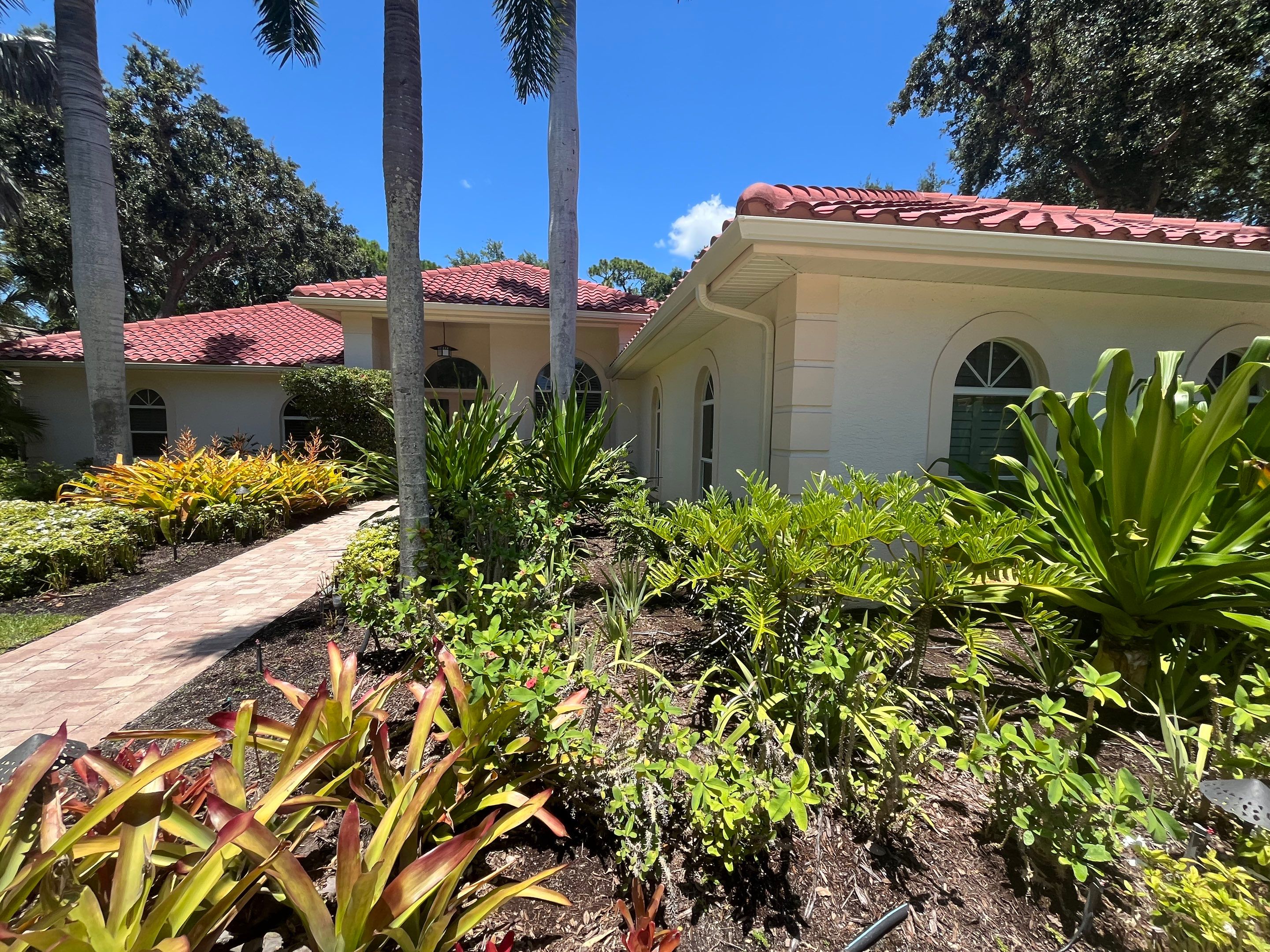 Splash Guard Gutters for Rainy Season Protection in Osprey FL by Gutter Professors