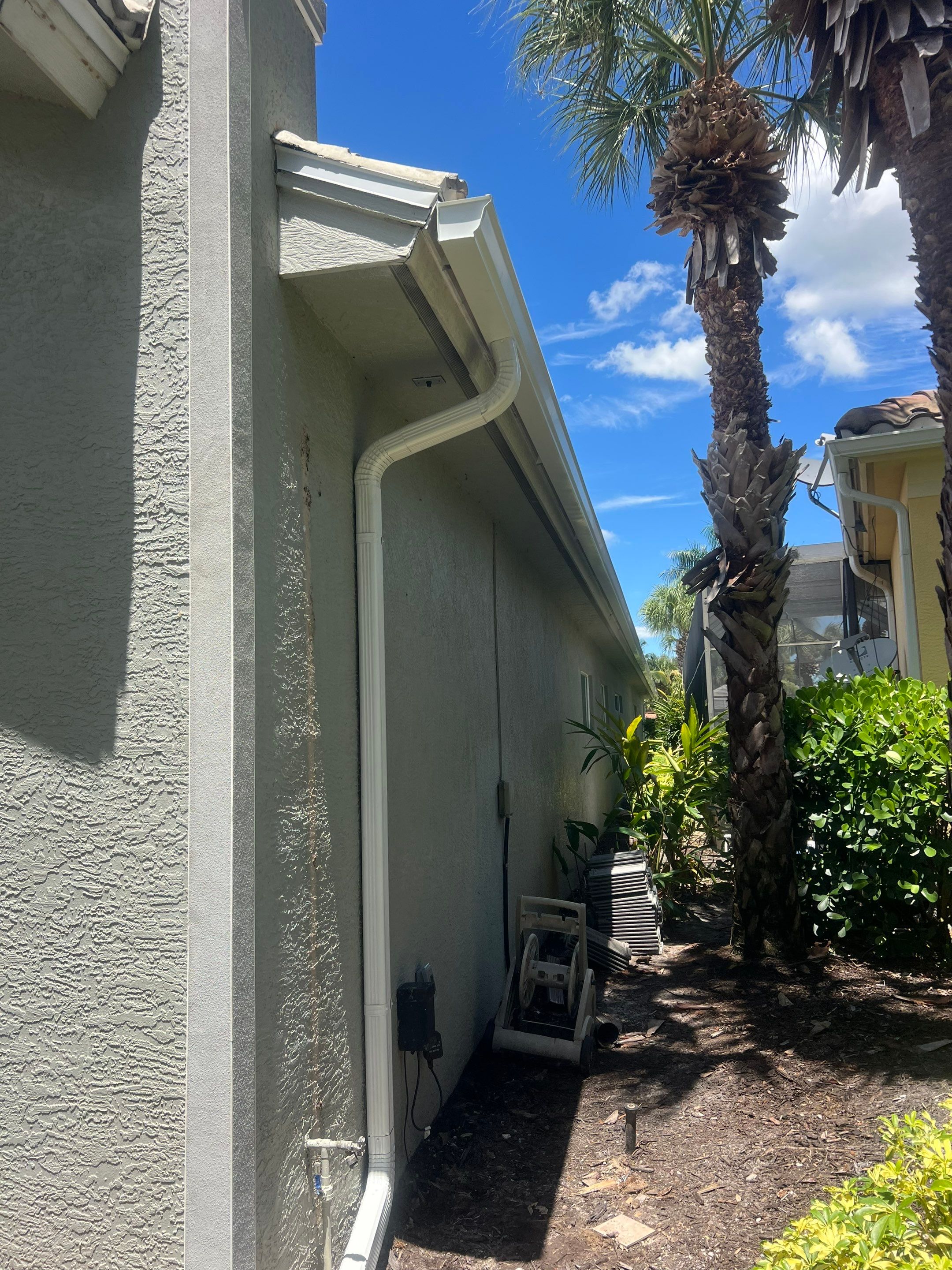 6 Inch Seamless Gutters and Downspout Installation in Naples FL by Gutter Professors