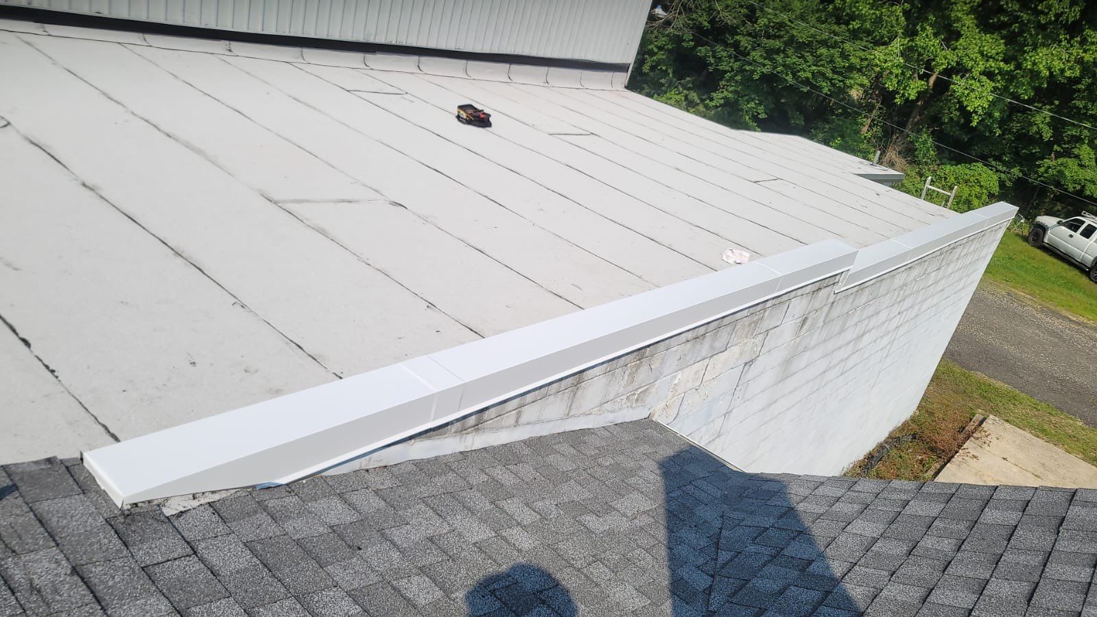 Roof Installation using Silicone APP Elevate Coating by ExteriorPros