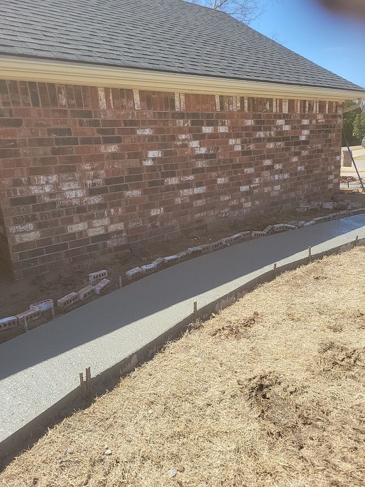Concrete sidewalk using Concrete by Clays Services Inc