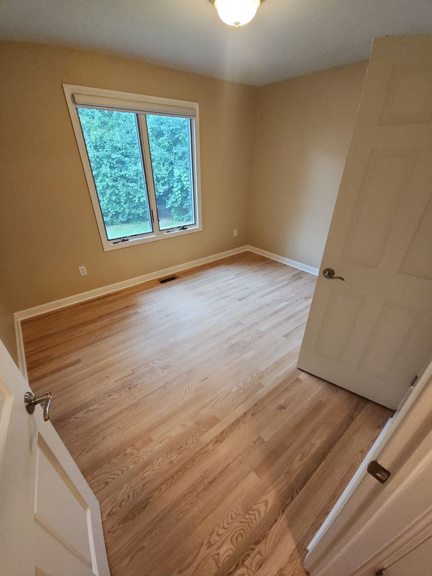 New Red Oak Natural bedroom and hall  by Ann Arbor Hardwoods 