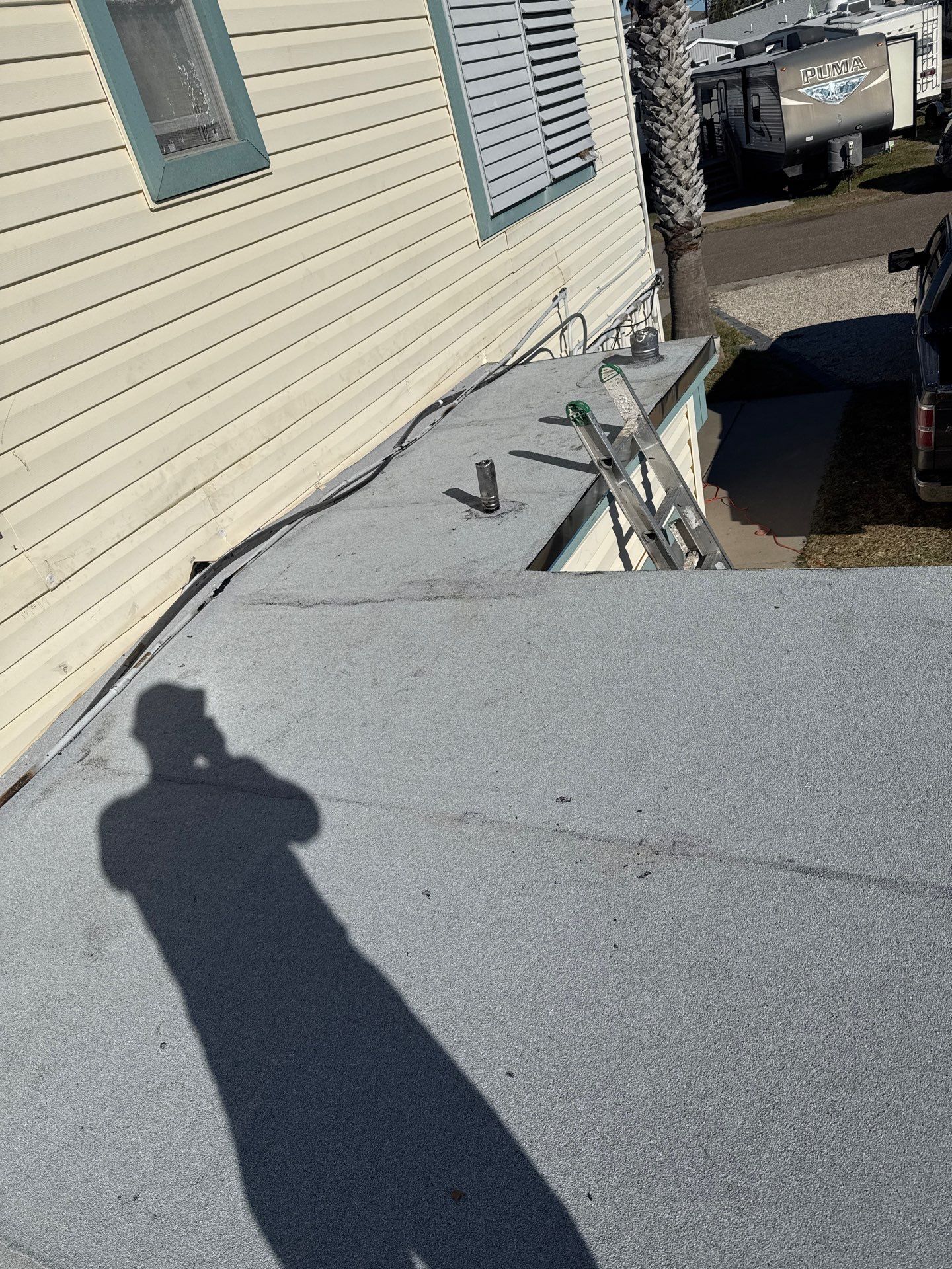 Mustang Island Flat Top by Bayfront Roofing and Construction