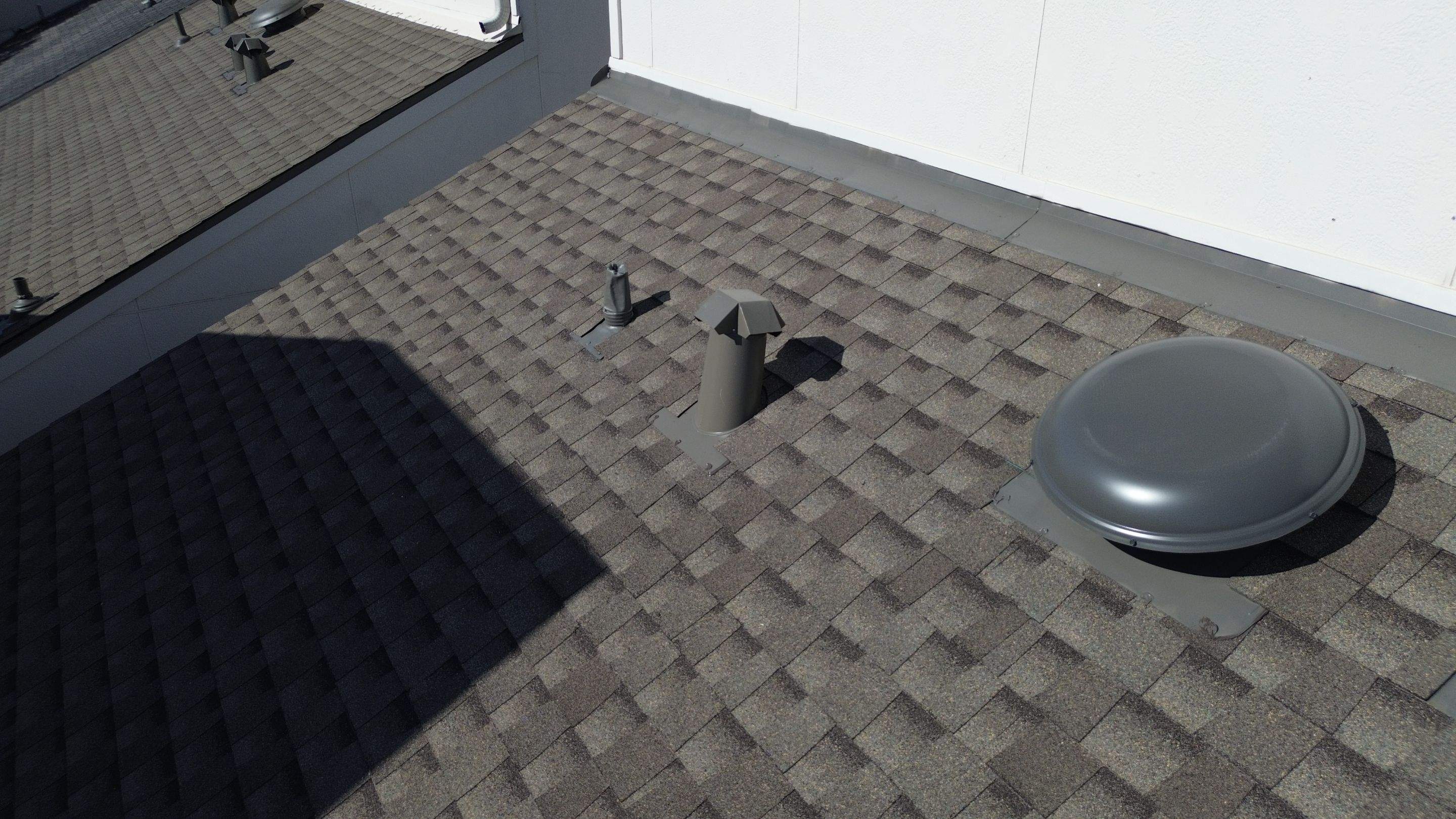 Four Story Townhome Roof Replacement by Houston Roofing & Construction