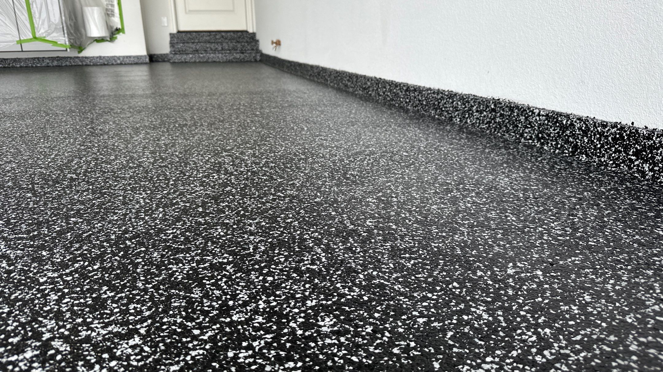 John H. received his dream garage with cabinets and a Banner Garage Floor by Banner Garage