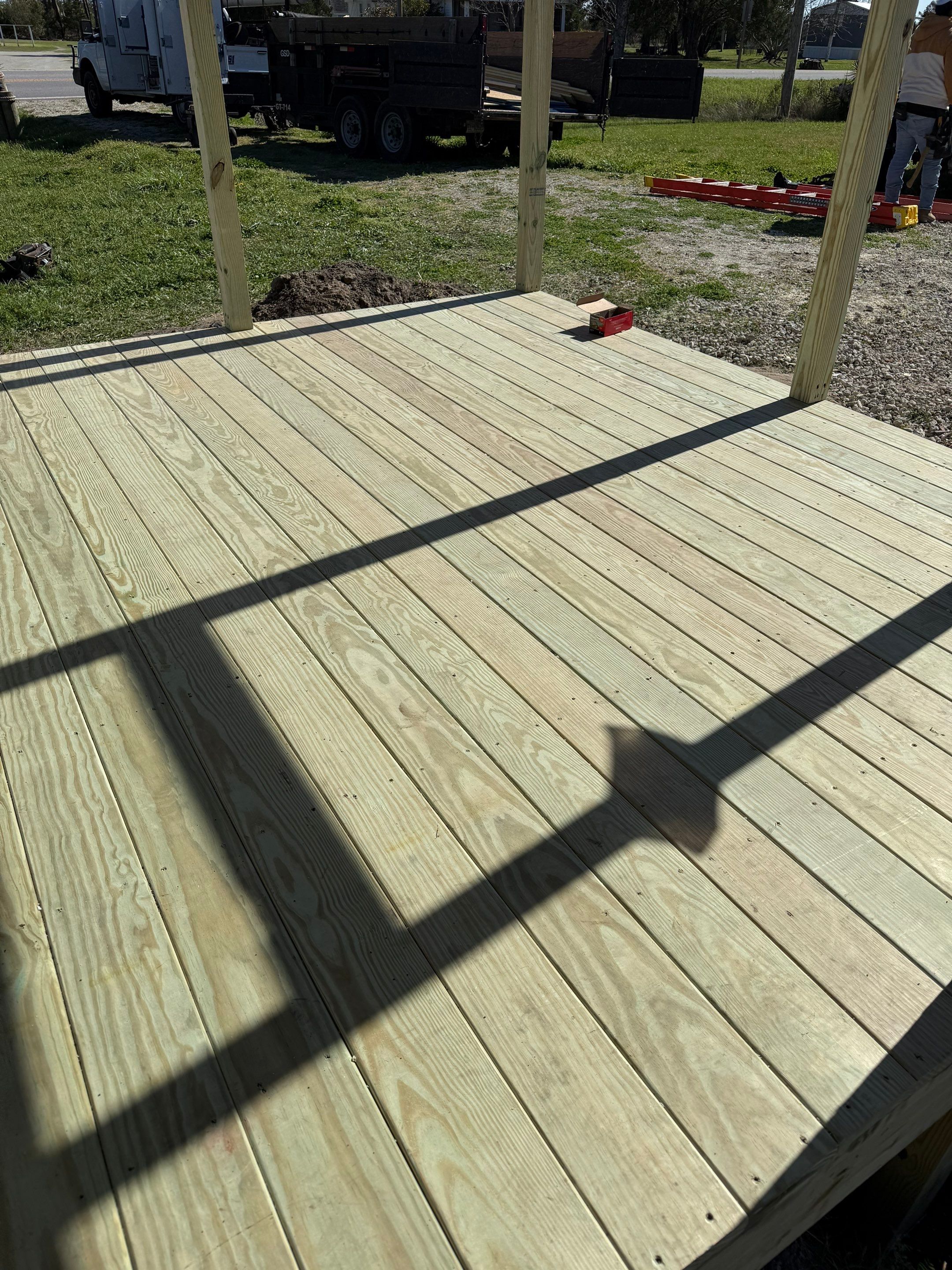 Custom Screened Porch and Deck Addition in Sea Level by The Remodeling Company