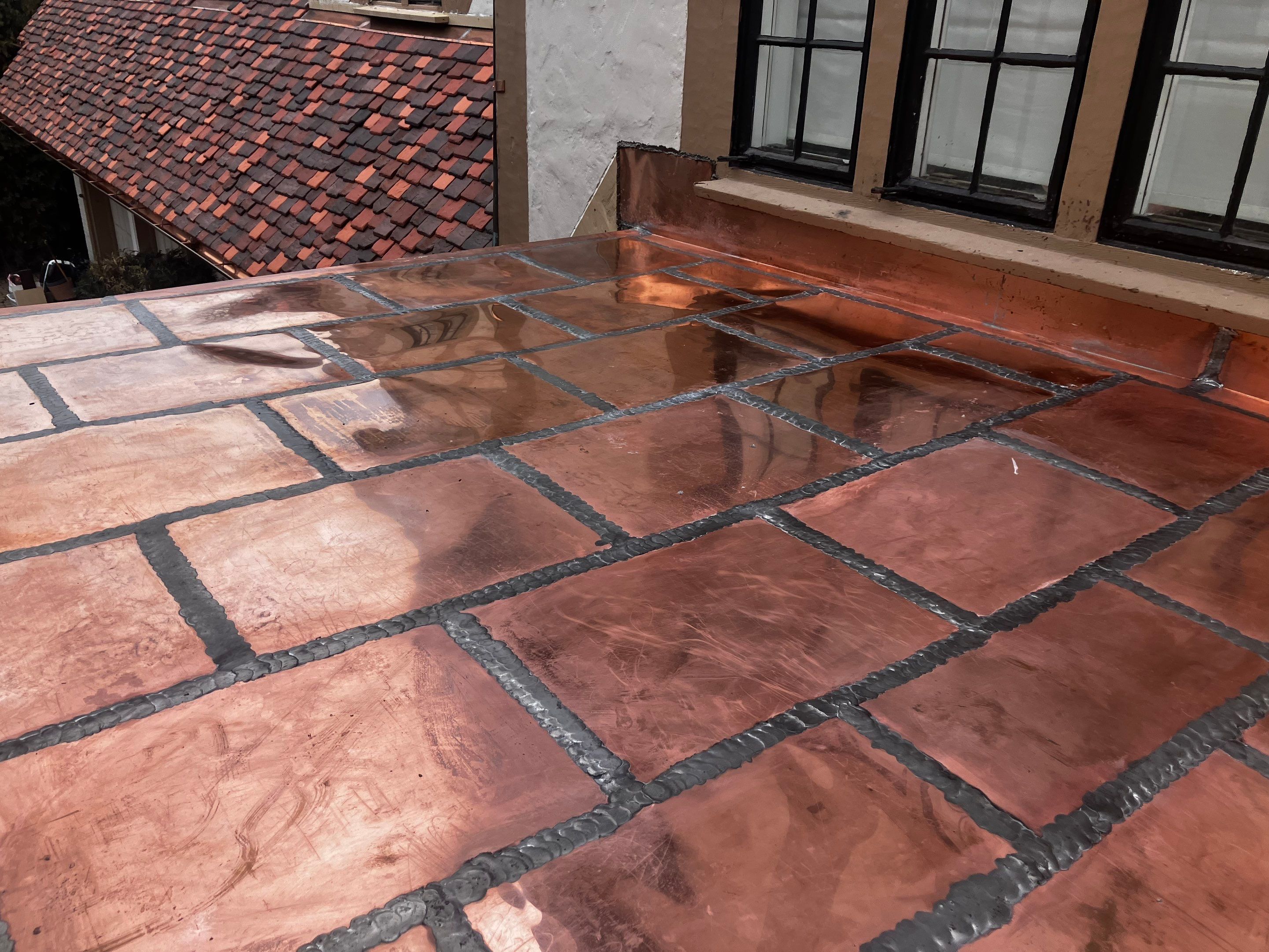 Ludowici Roof Installment and Half Round Copper Gutter Replacement  by Custom Installations