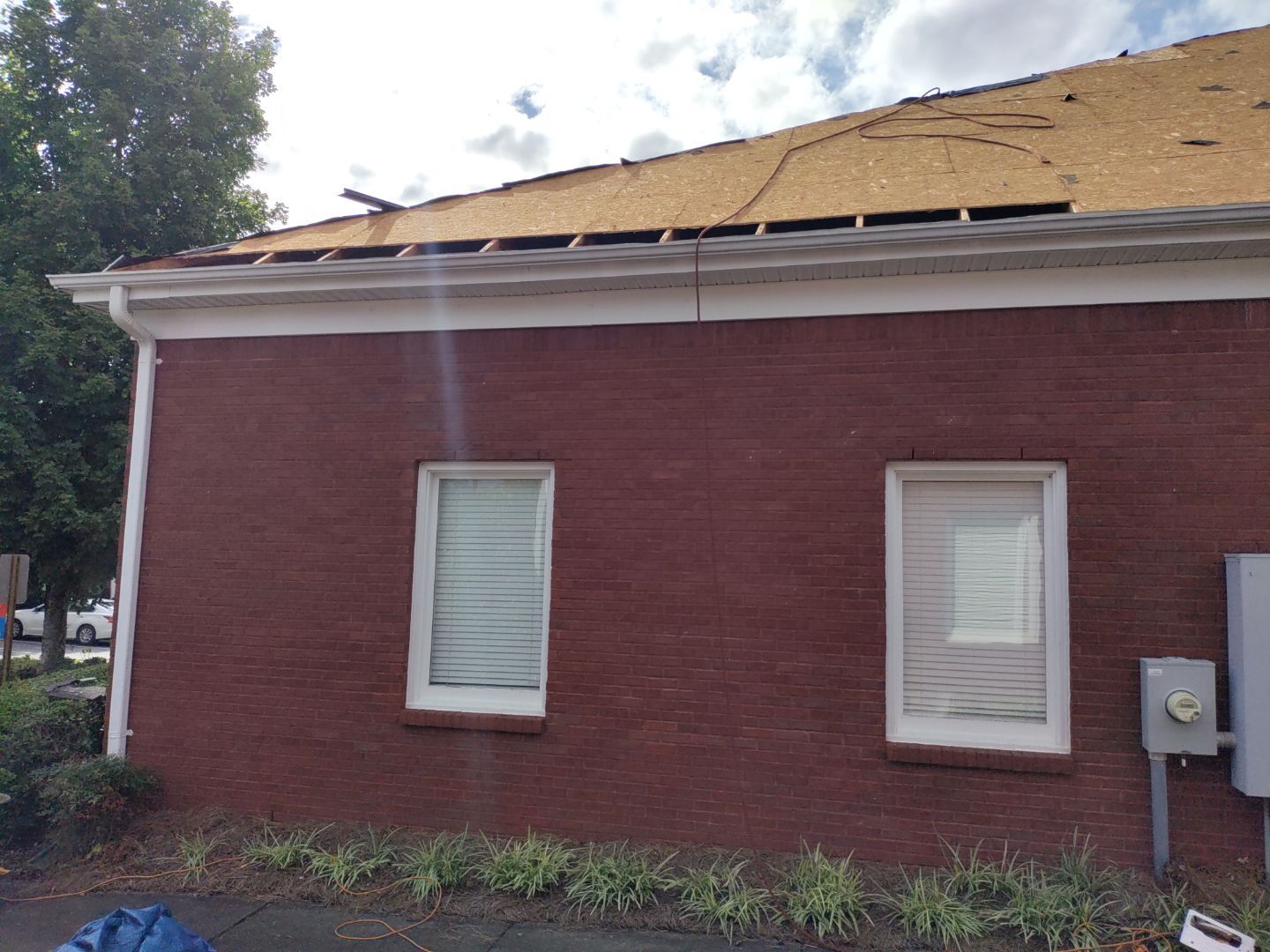 Commercial Roof Replacement using Owens Corning by Inspector Roofing and Restoration