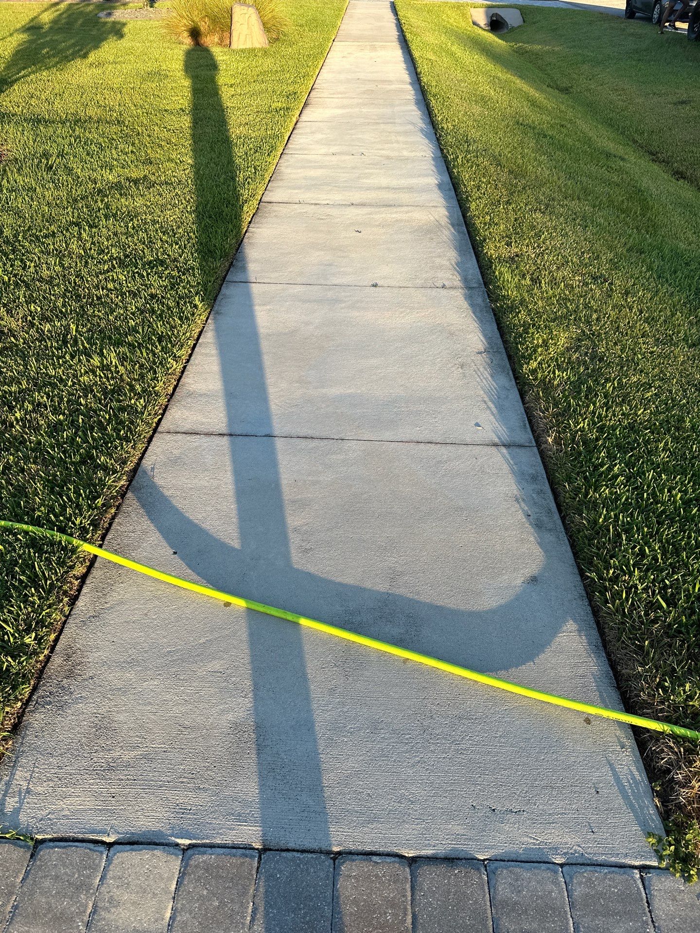 Paver Driveway, Sidewalk, and Pool Deck Cleaning in Winding River Community, Bradenton, FL by Sunshine AquaWash