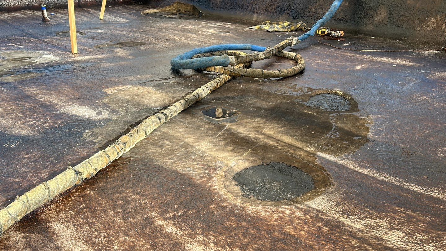 Foam Refurbish using Conklin Benchmark/PUMA XL coatings and spray foam; Also metal roofing around parapet wall by Straight Edge Roofing Inc