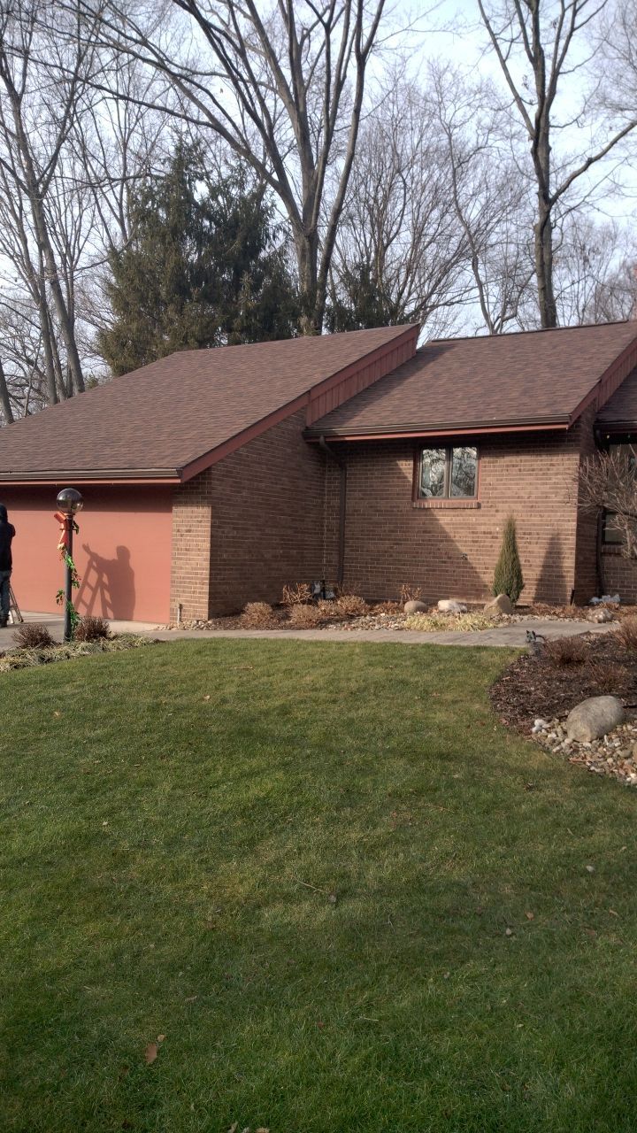 Residential Roof Replacement by Absolute Roofing and Construction