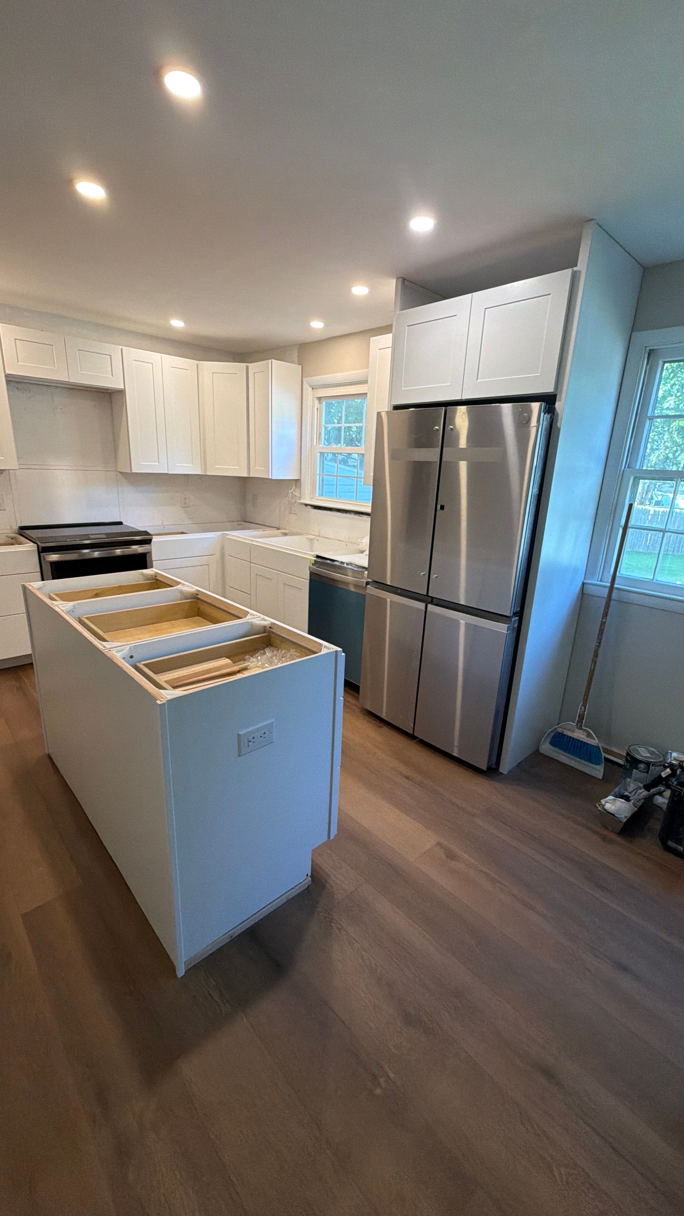 Phoenixville Kitchen Remodel with White Shaker Cabinets and Green Backsplash by Reliable General Contracting