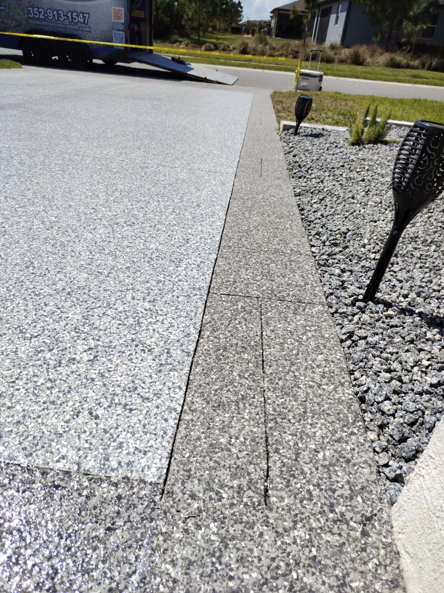 Driveway and Sidewalk in Slatestone with Silvercreek Border by Innovative Concrete Coatings 