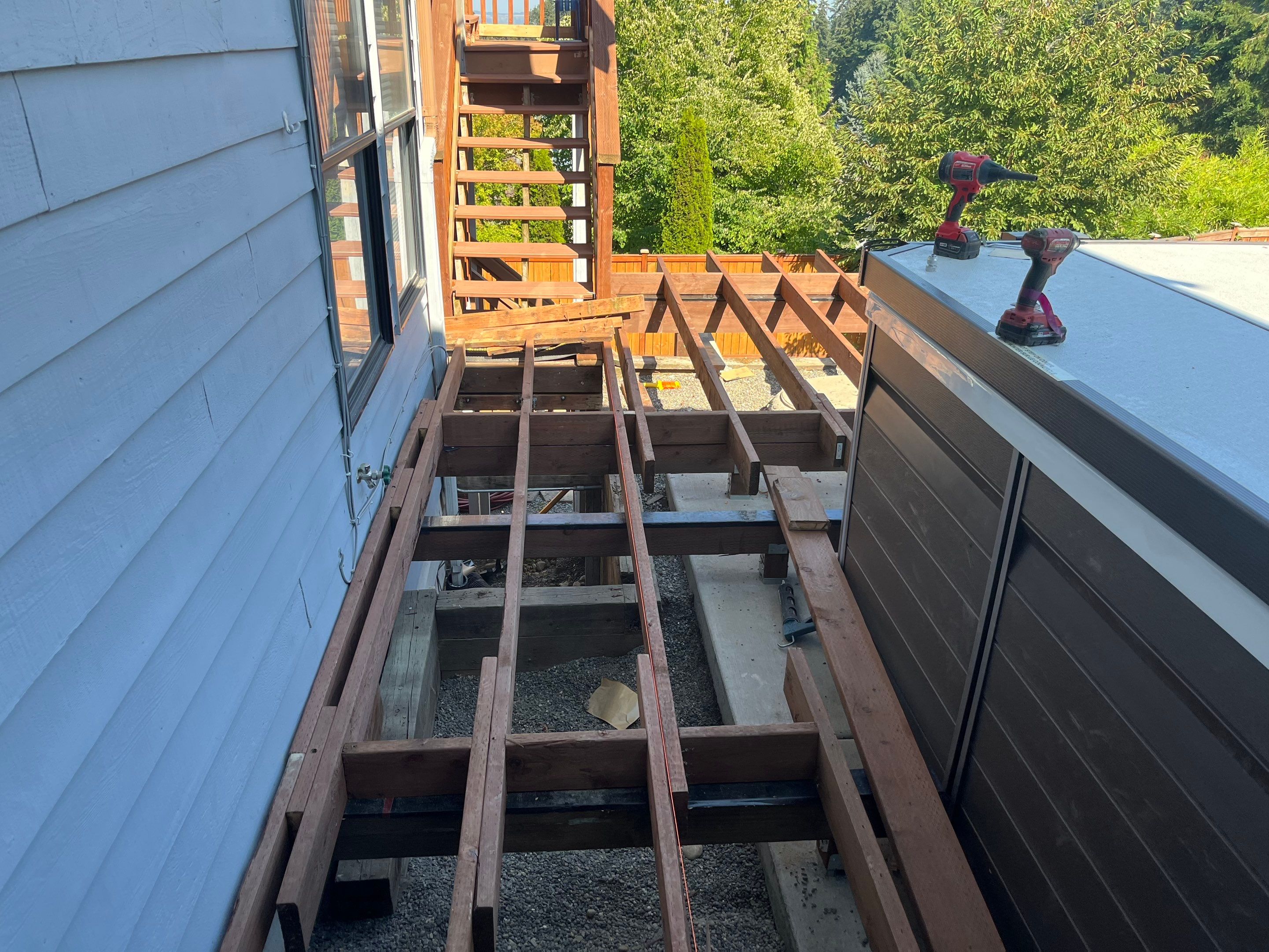 Tacoma Custom Composite Deck and Hot Tub Surround with Retaining Wall by Emerald City Energy 