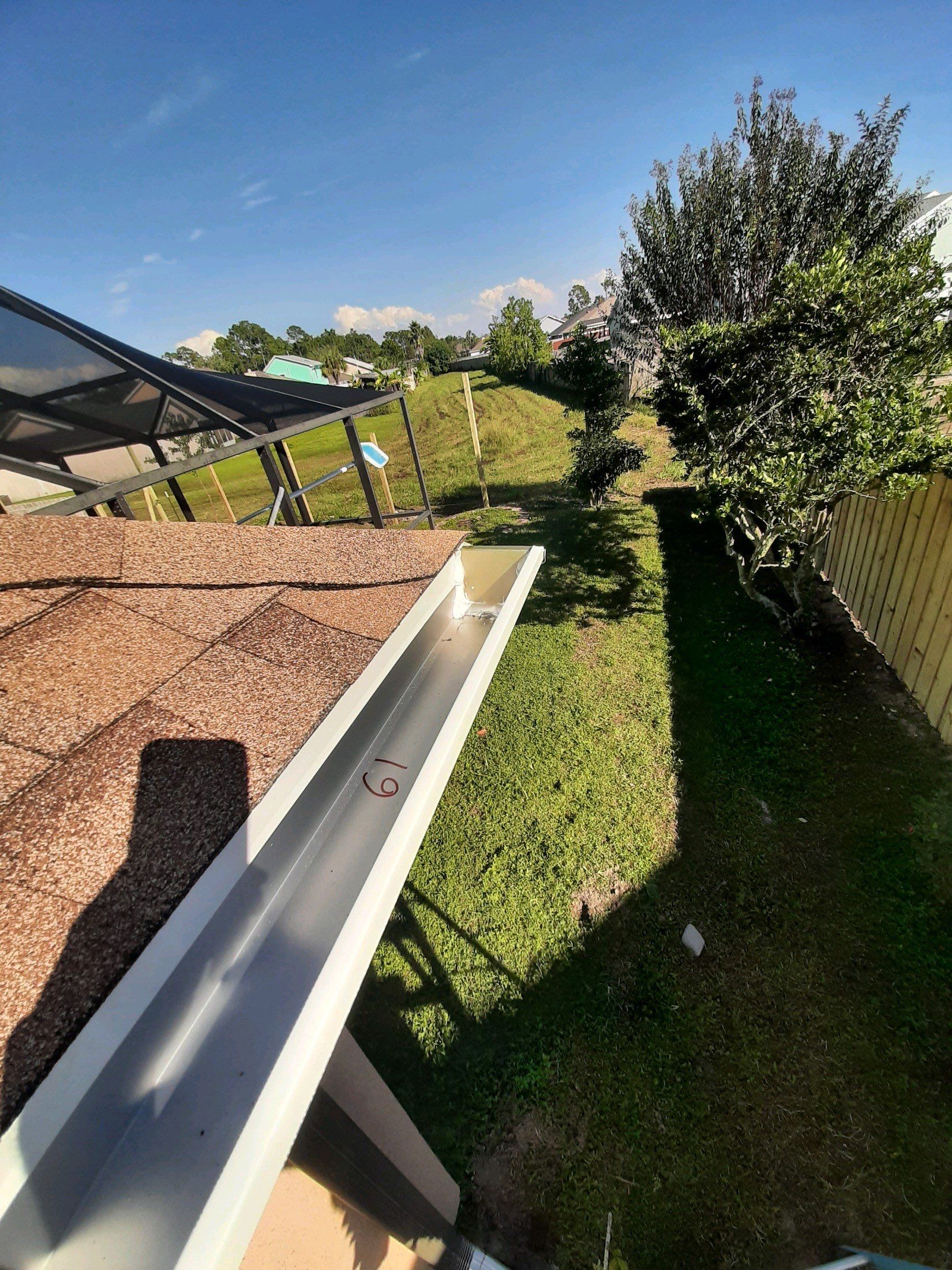 Seamless Gutter Installation using White K-Style Gutters by Gutter Professors