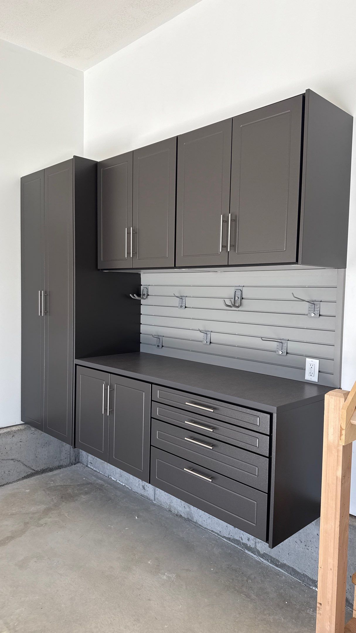 Nice Clean Look With These Pewter Cabinets by Banner Garage