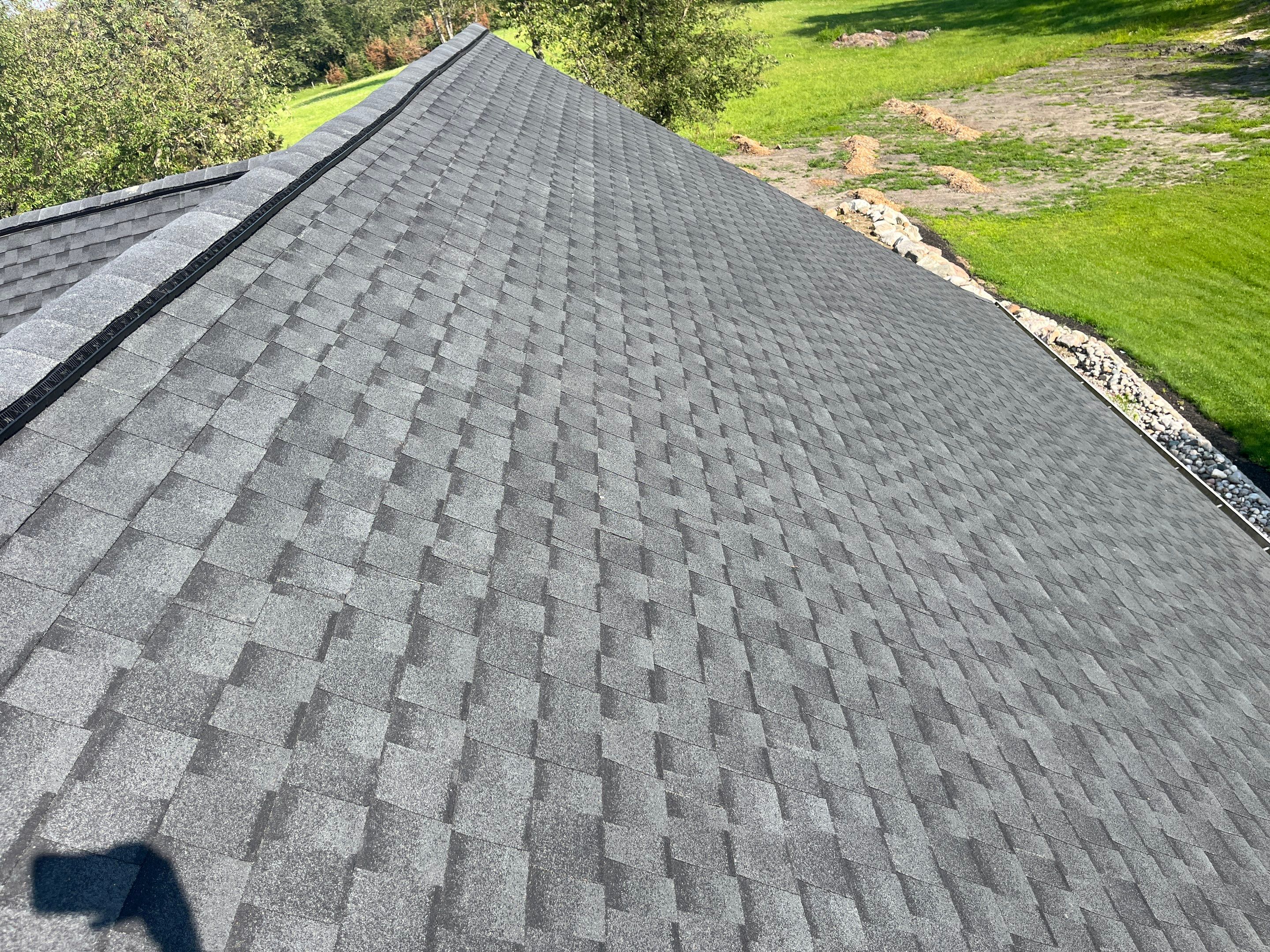 Re-roofing After A Hail Storm in Howell by Acme Exteriors