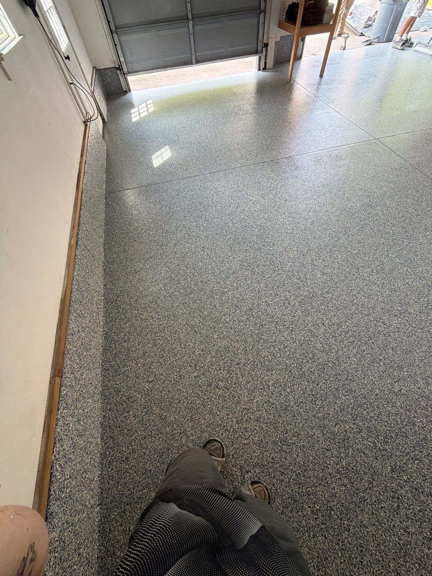 Custom Tidal Wave Epoxy Flake Floor Installation in Norton Shores. by Gordon Painting