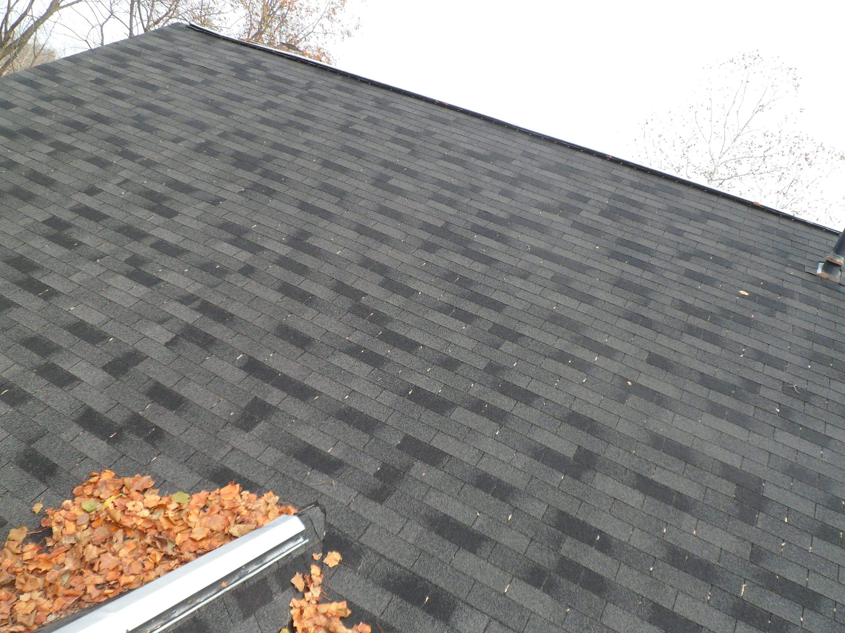 Residential Roofing Installation using Charcoal Black by Alpha Design Services