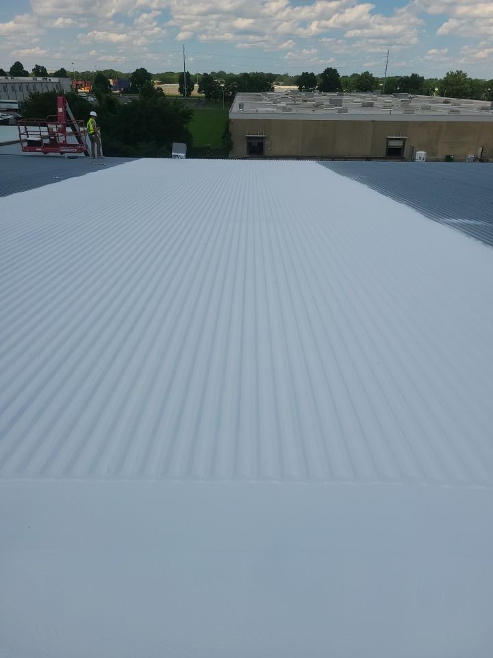 Commercial Metal Restoration System using Aldocoat Coatings by Hostetler Roofing