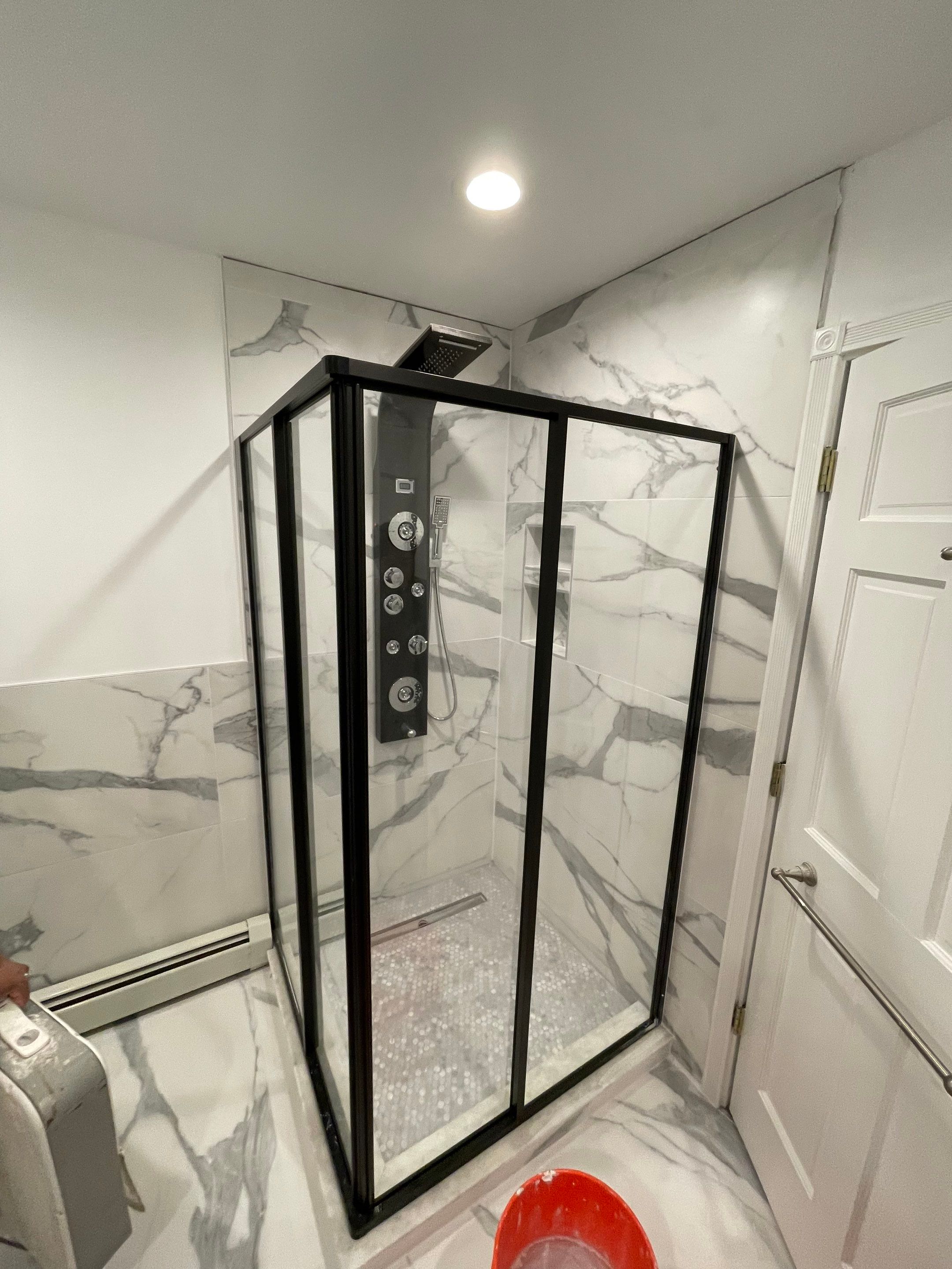 Bathroom Remodel using Tile by Home Concepts Construction