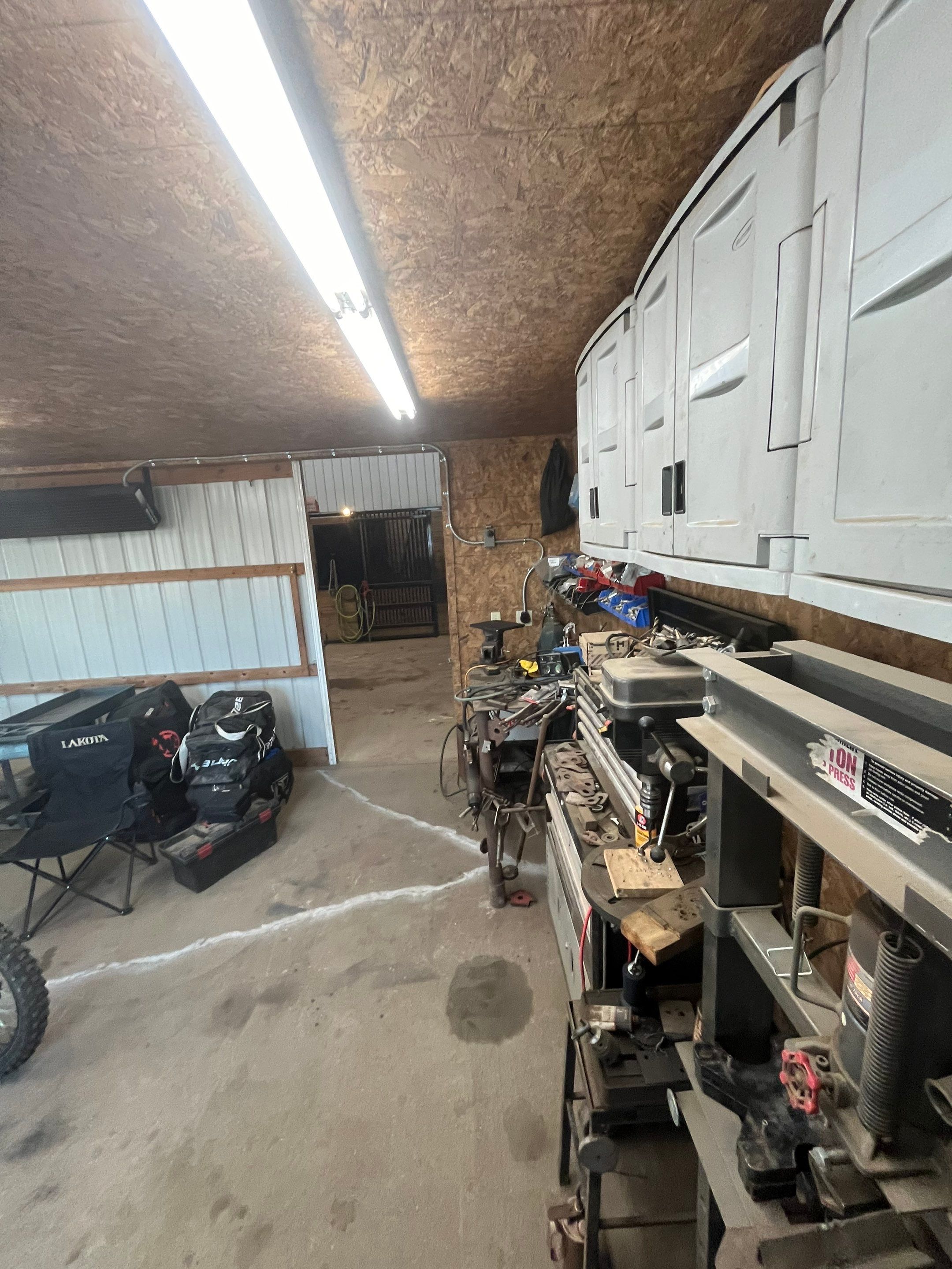 Basement using Tidalwave by Select Painting, Coatings & Garage Cabinets