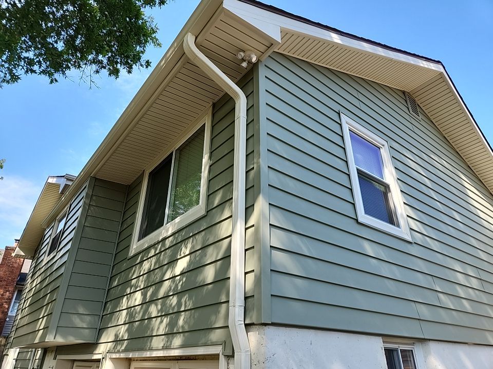 Siding Installation using Crane board D7 by EEC  Windows, Siding & Roofing 