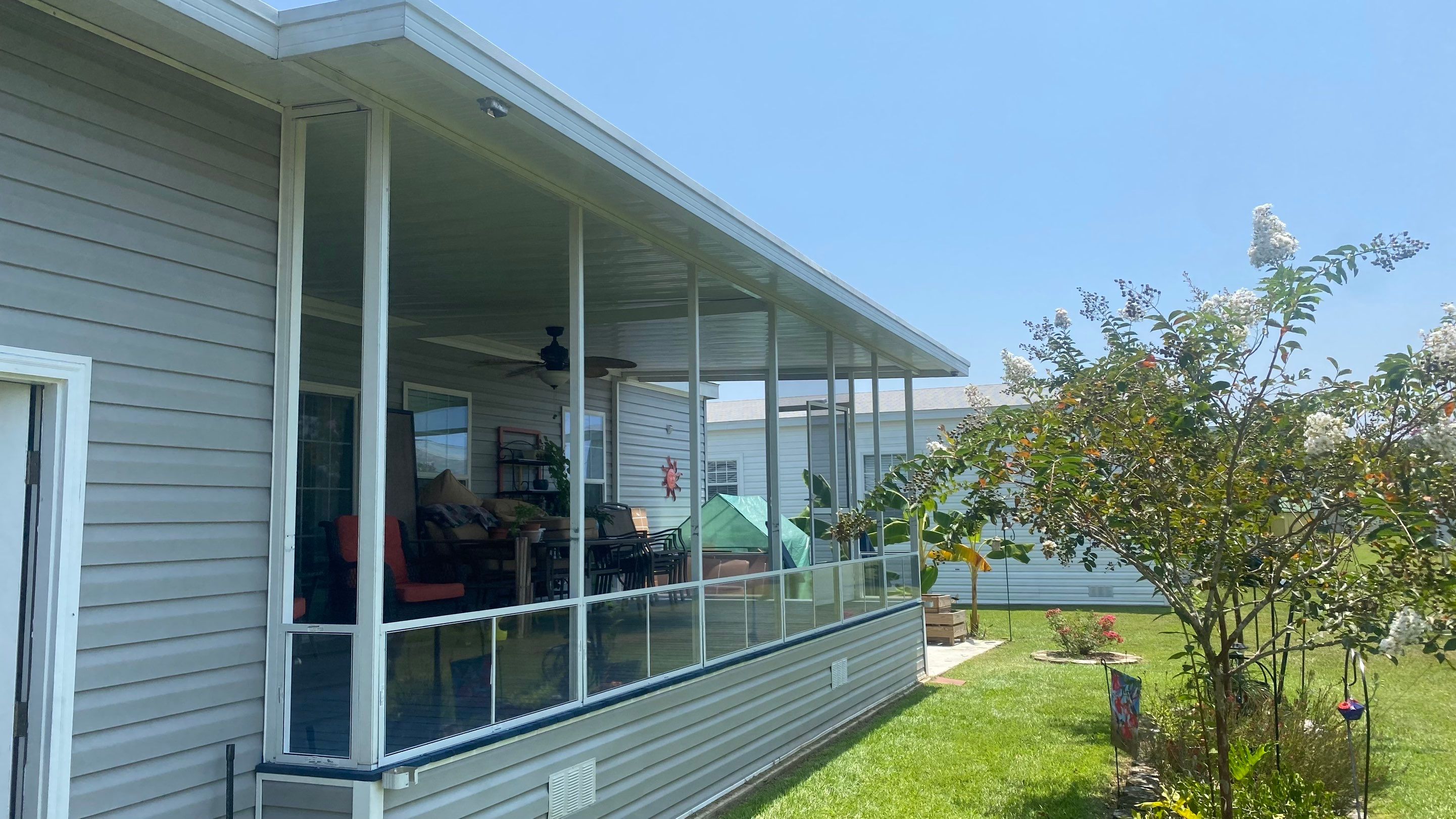 Screen Under w/Vinyl 4 Track Windows by Titan Sunrooms
