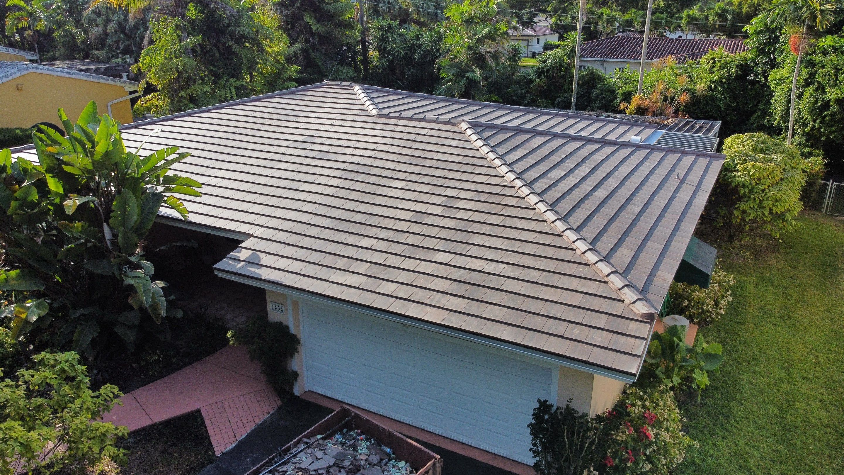 Residential Roofing Installation using 13" Flat Tile by BOB HILSON & CO INC