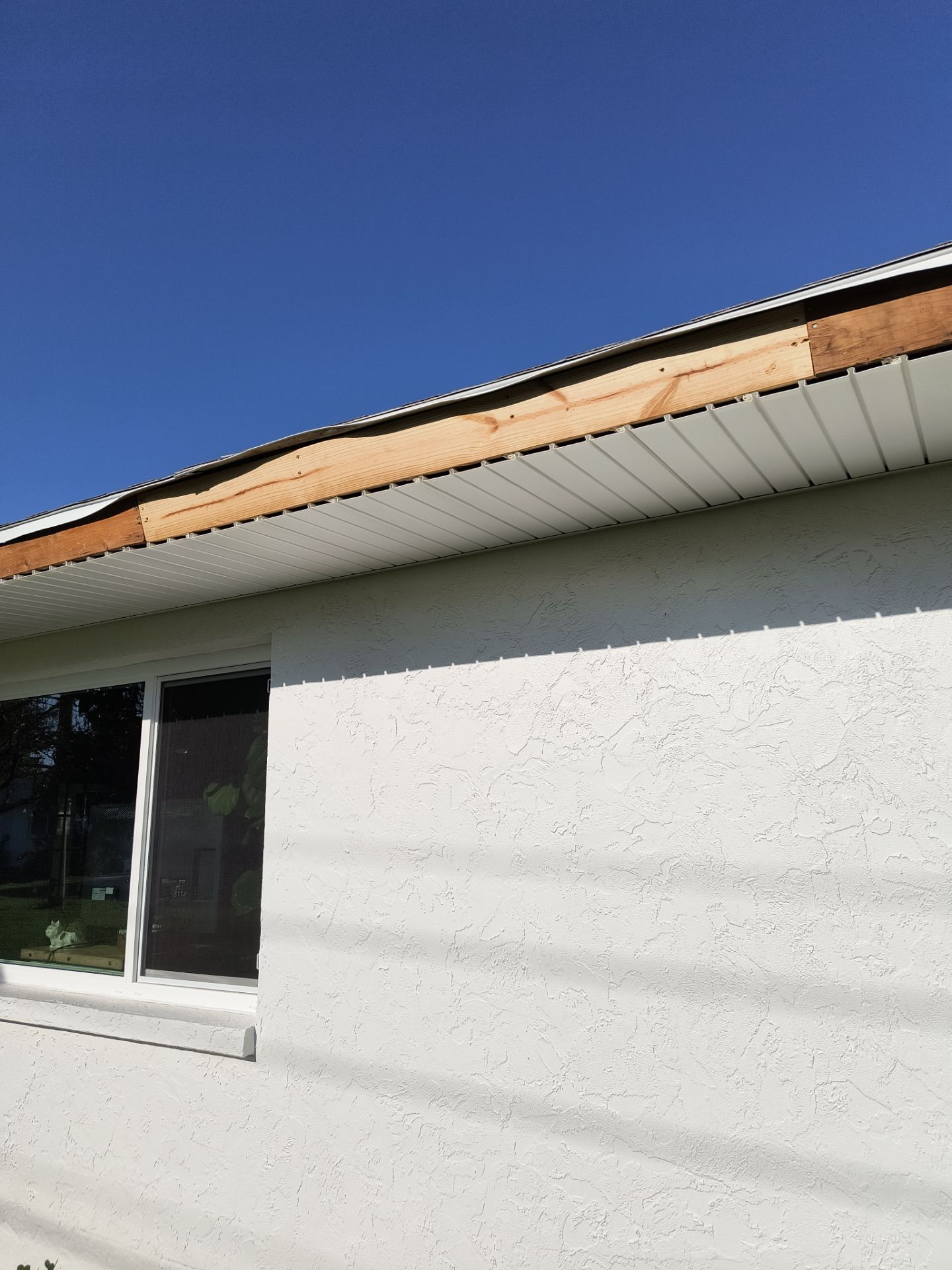 Aluminum White Soffit Installation in Sarasota FL by Gutter Professors