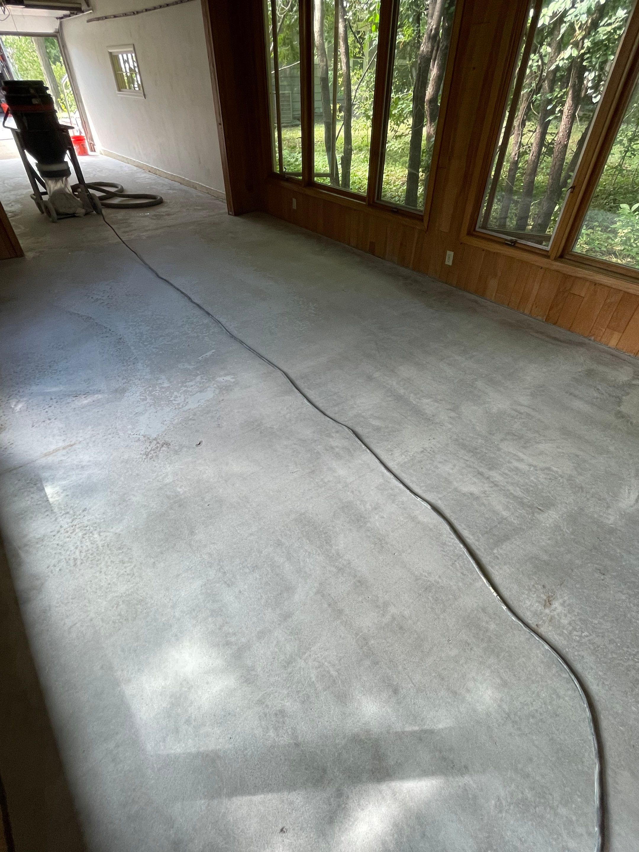 Sioux Falls Garage and Sunroom Concrete Coating with Coyote Flake by Select Painting, Coatings & Garage Cabinets