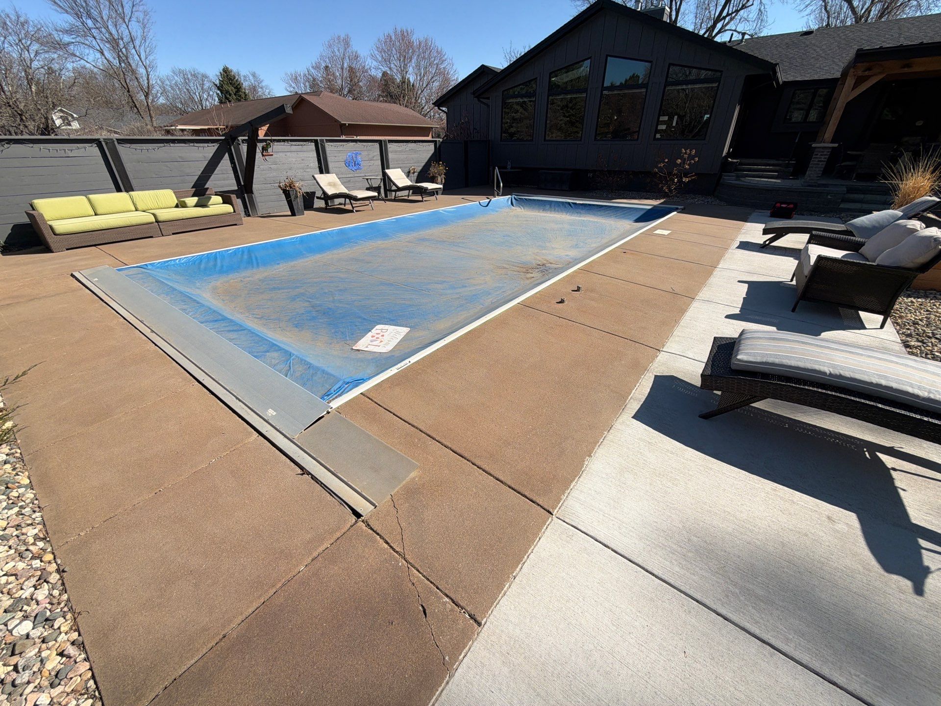 Garage Floor and Textured Pool Deck Coating in Sioux Falls by Select Painting, Coatings & Garage Cabinets