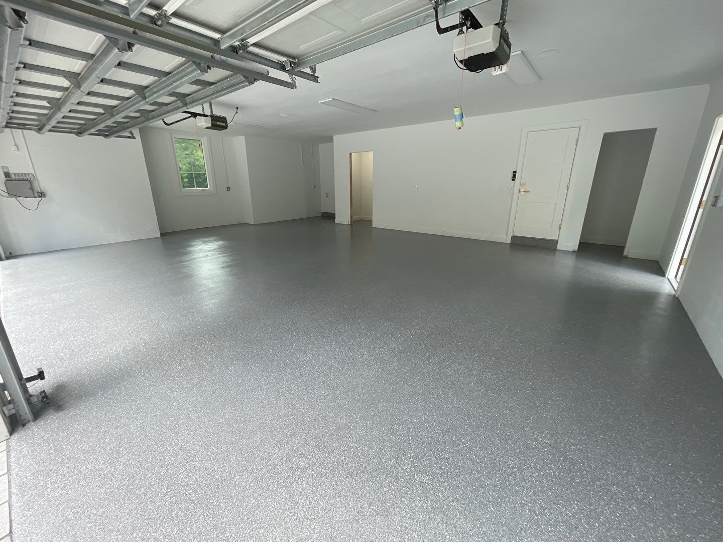 Garage Project in Gainesville, FL in Hybrid Turquoise  by Cross Creek Concrete Coatings