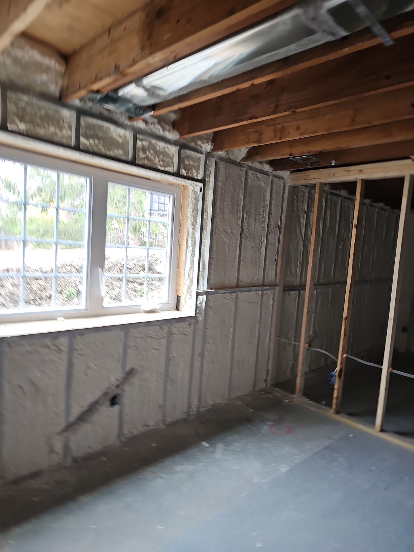 Basement Exterior Walls using Closed Cell Spray Foam by NYS Foam & Energy