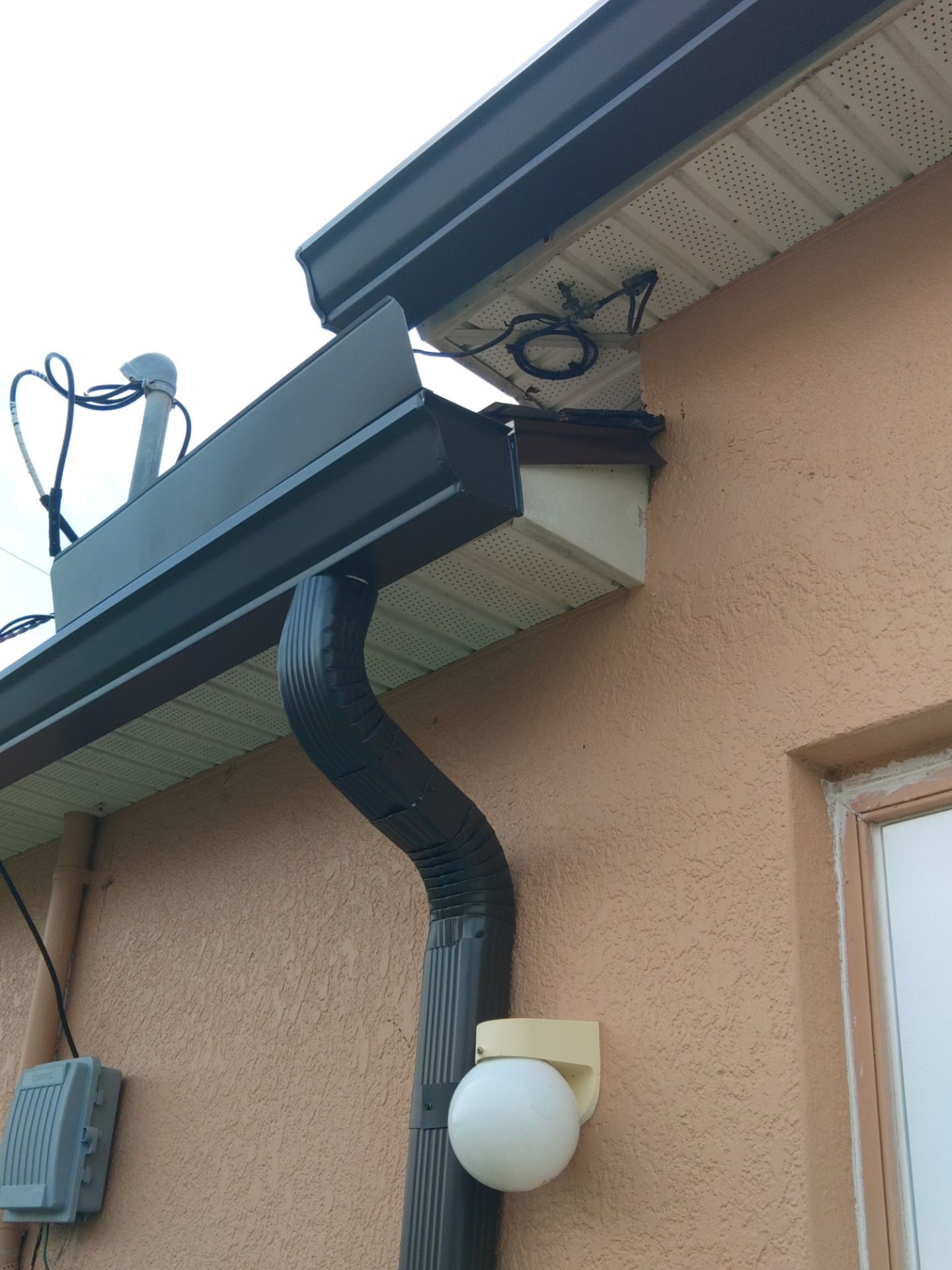 Downspout Installation for Multi-Story Homes in Cape Coral FL by Gutter Professors