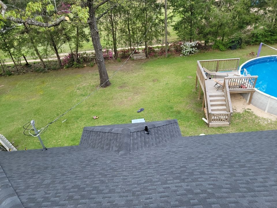 Residential Roofing Installation using Roof Replacement by American Roofing & Construction LLC