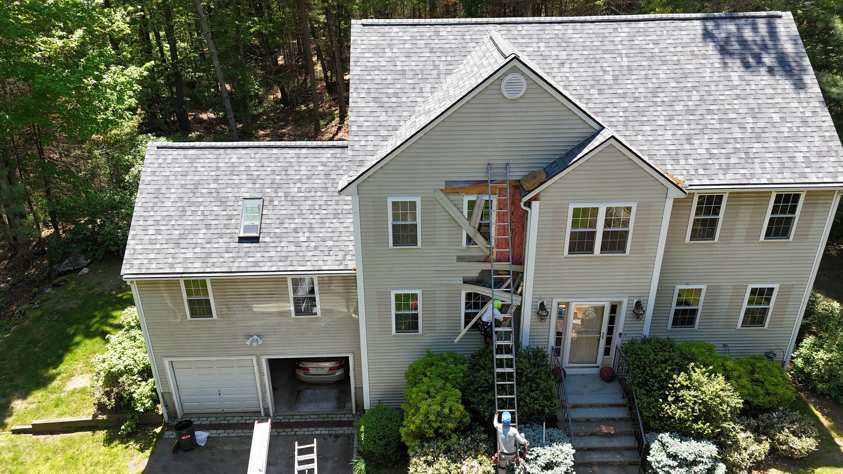 Leak Repair & Gutter Replacement in Chelmsford, MA by Mighty Dog Roofing of Greater Middlesex County
