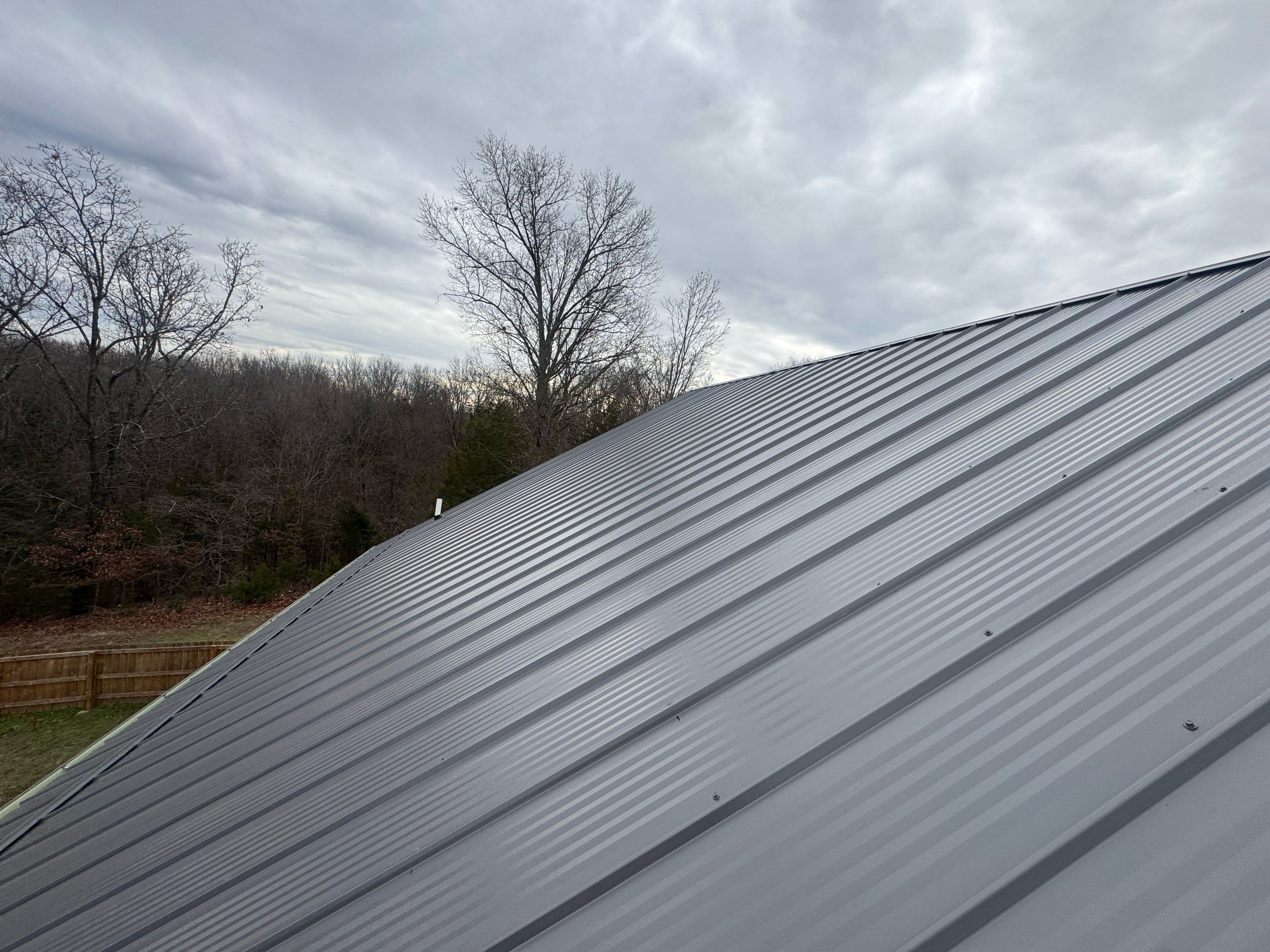 Residential Roofing Install - M Rib Exposed Fastener - Color Charcoal  by Titan Commercial & Residential Roofing 