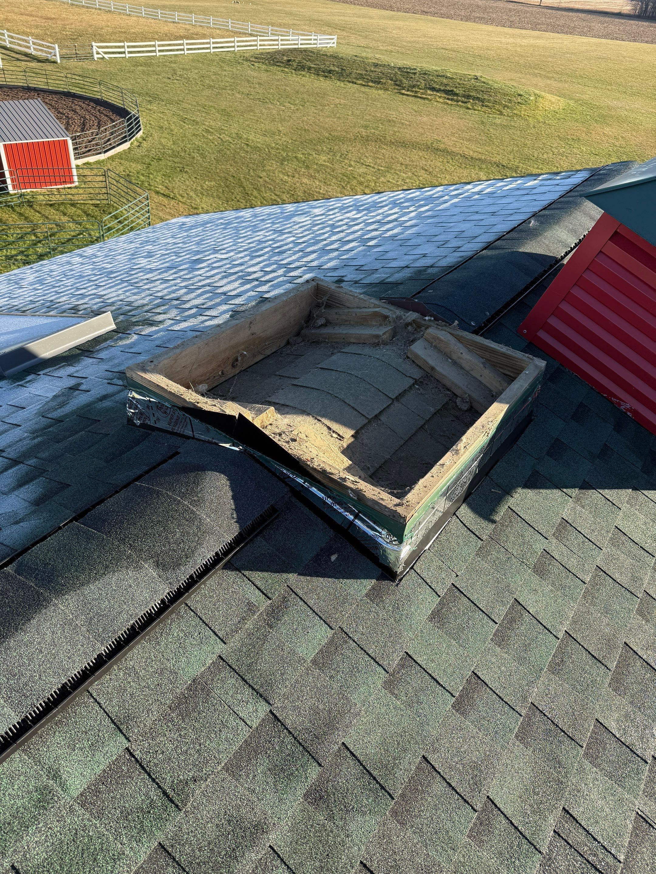 Residential Roofing Replacement with Multiple Skylights in Mason, Michigan by Acme Exteriors
