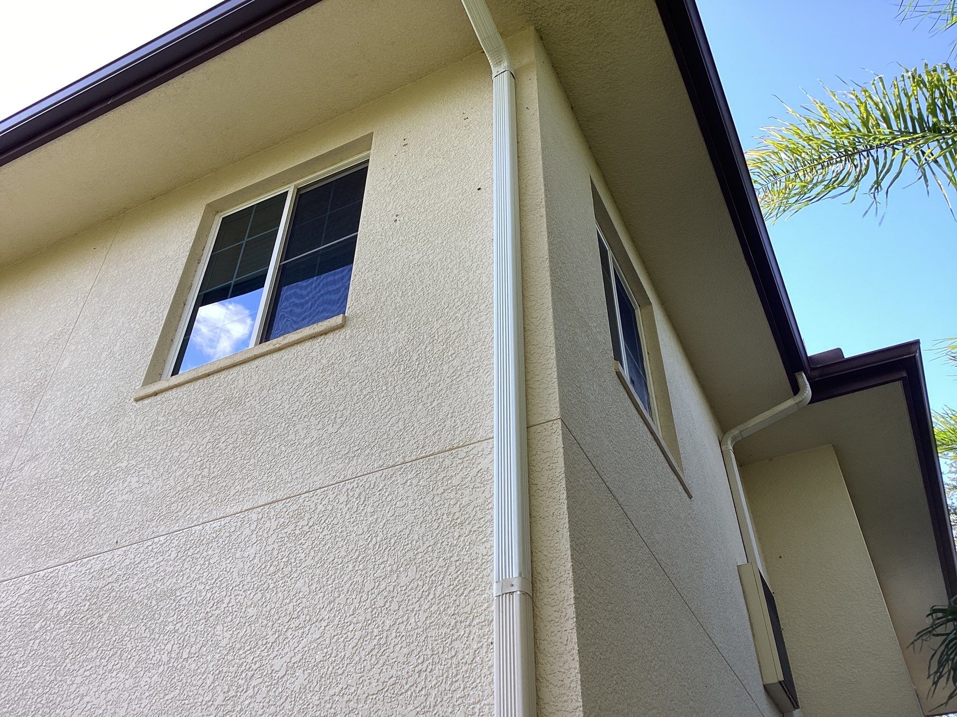 Musket Brown Seamless Gutters using Musket Brown Seamless Gutters in Capen Coral FL by Gutter Professors