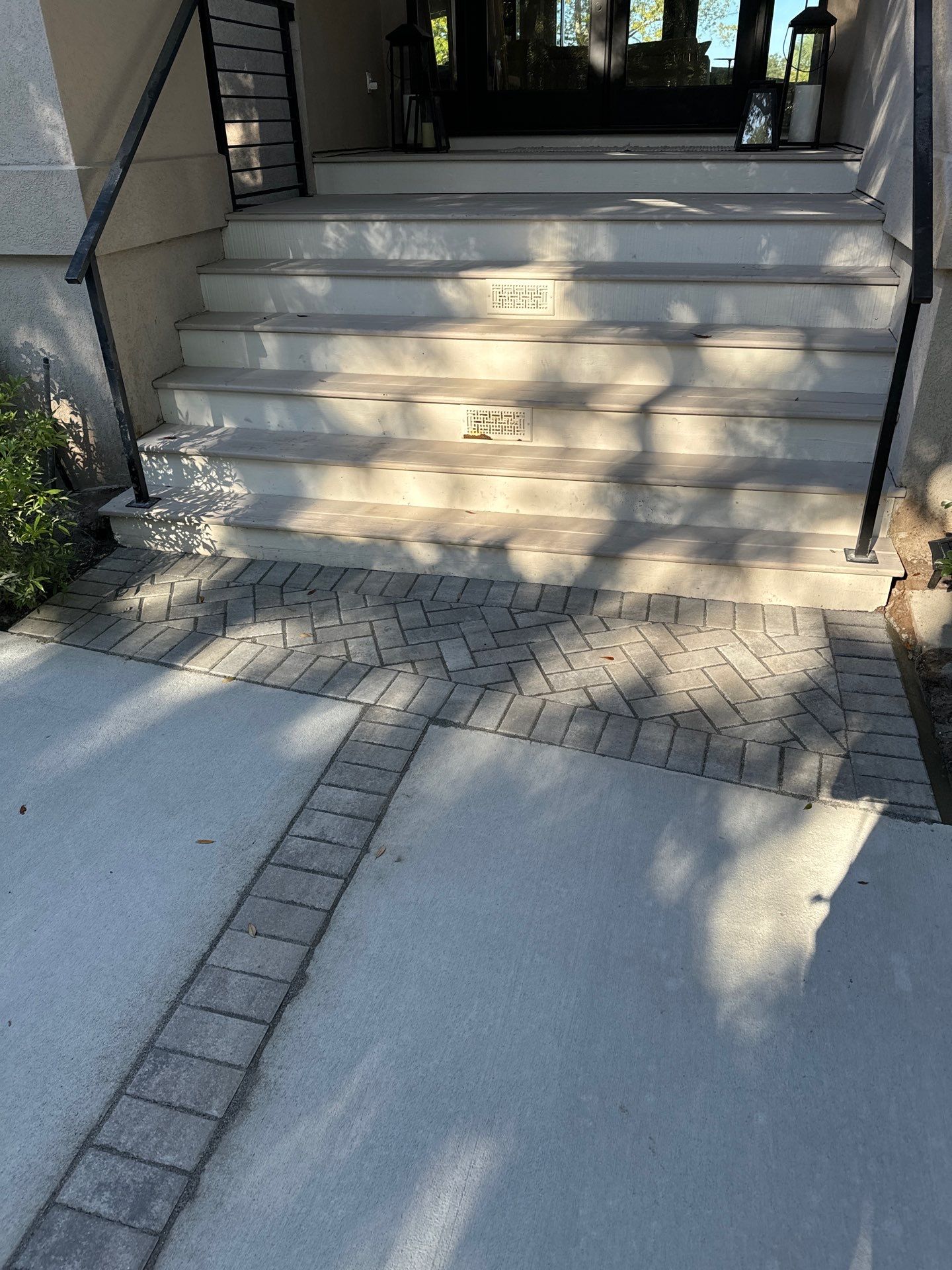 Custom Concrete Driveway with Decorative Paver Inlays in Hilton Head Island by Lowcountry Scapes, LLC