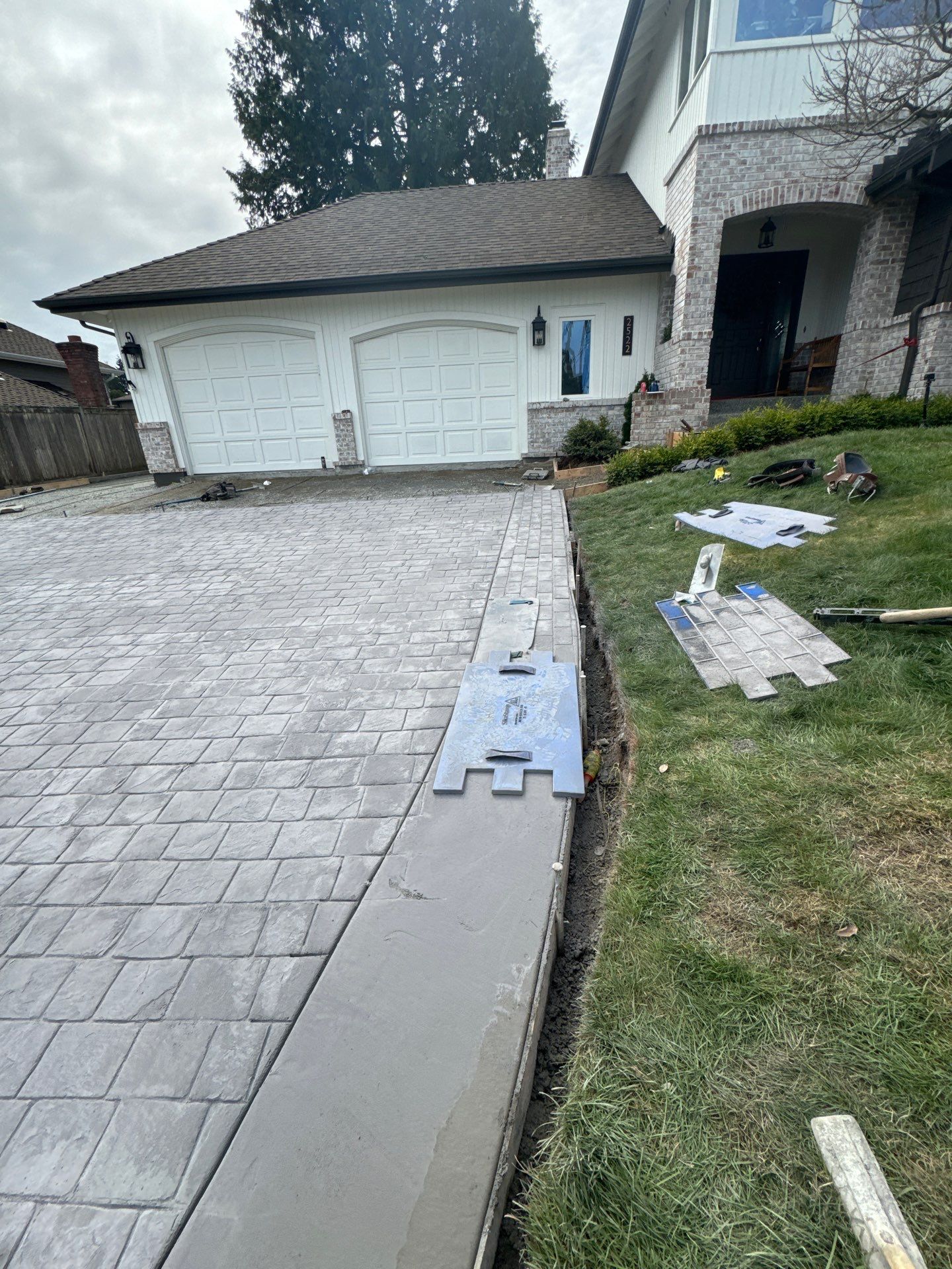 John | Stamped Concrete Driveway Makeover by Jireh Asphalt & Concrete Inc 