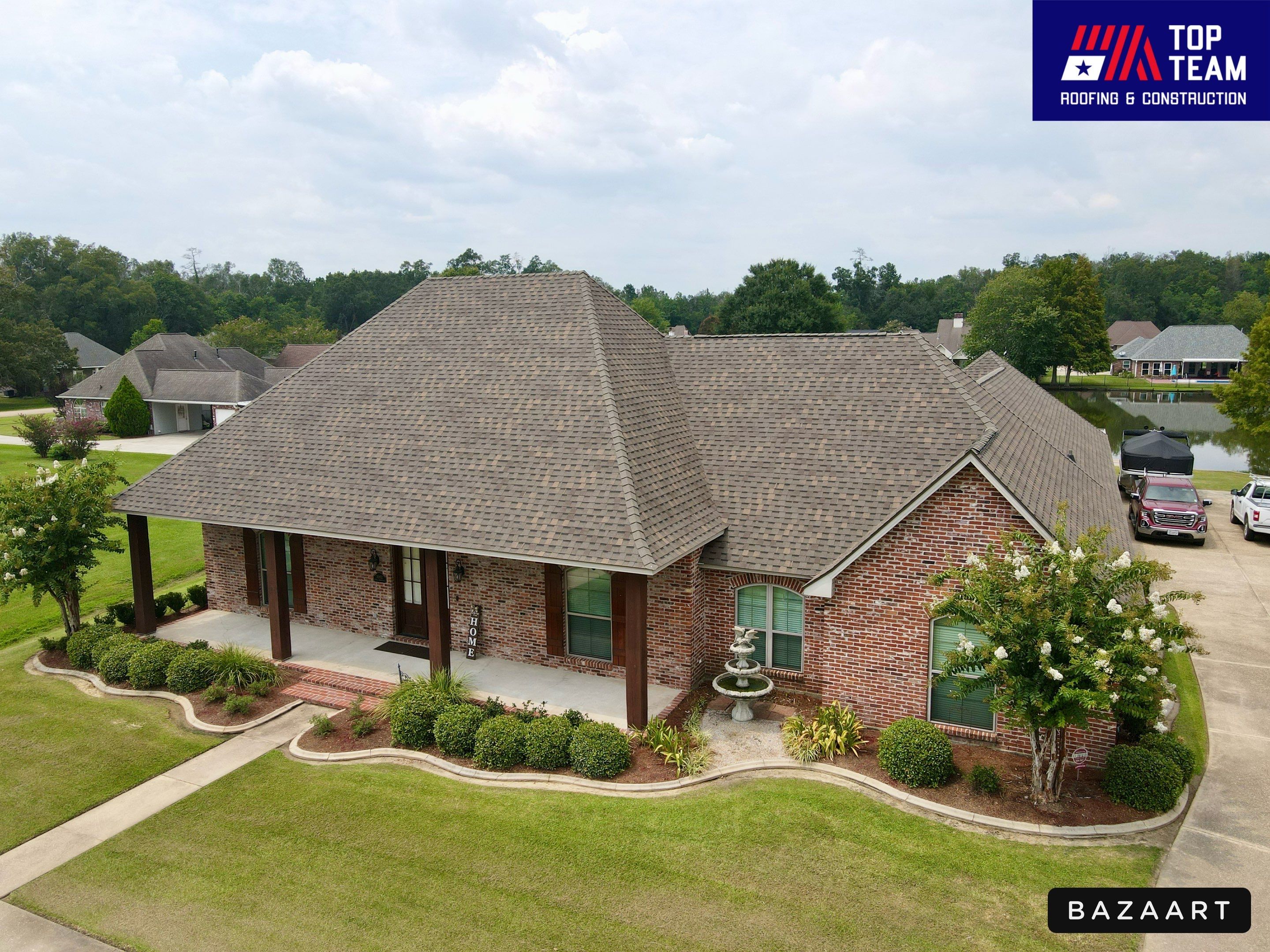 Residential Roofing Installation using Atlas Pinnacle Pristine Weathered Shadow and Atlas High Profile Ridge Cap by Top Team Construction